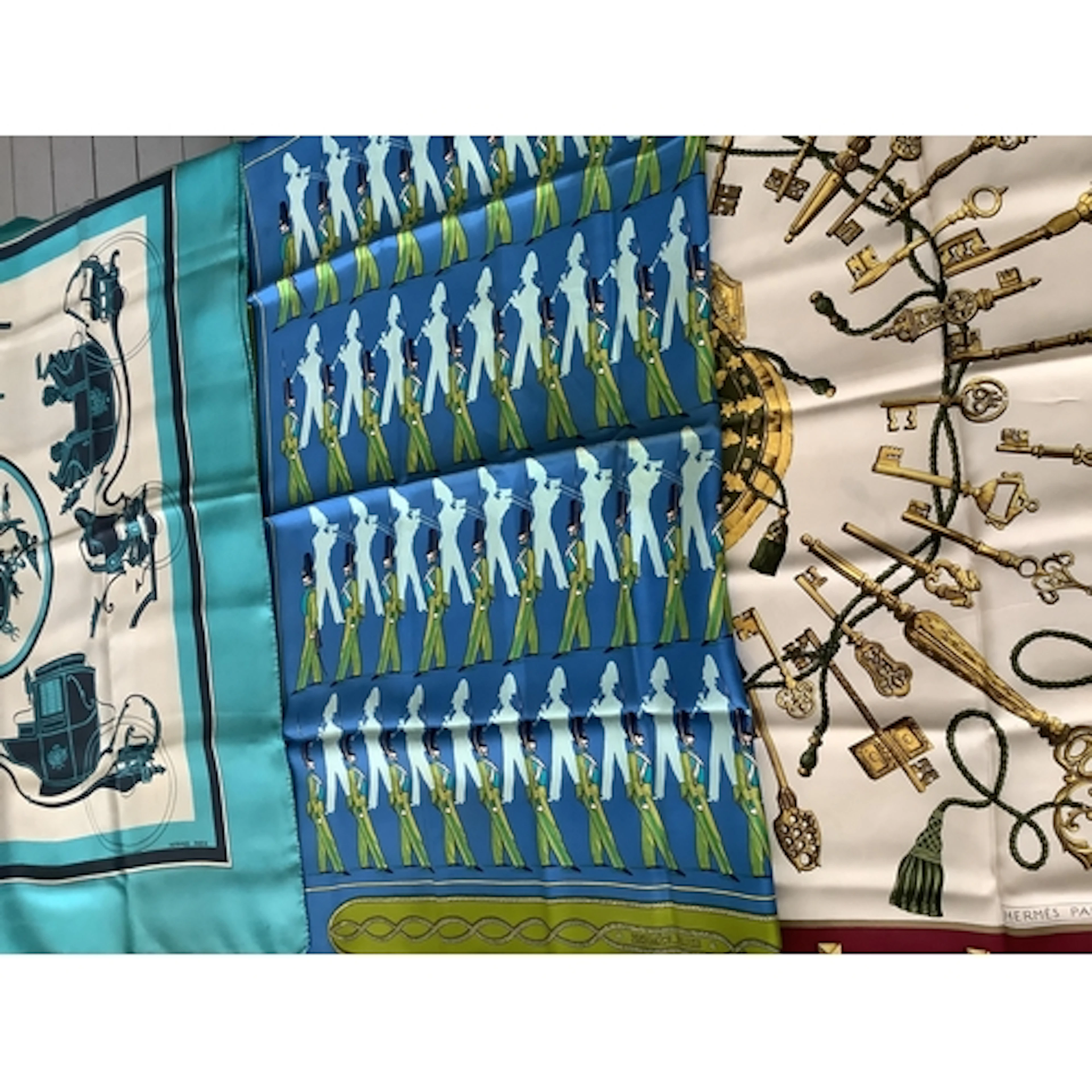 Three late 20th-early 21st century Hermes silk scarves, Ex-L...