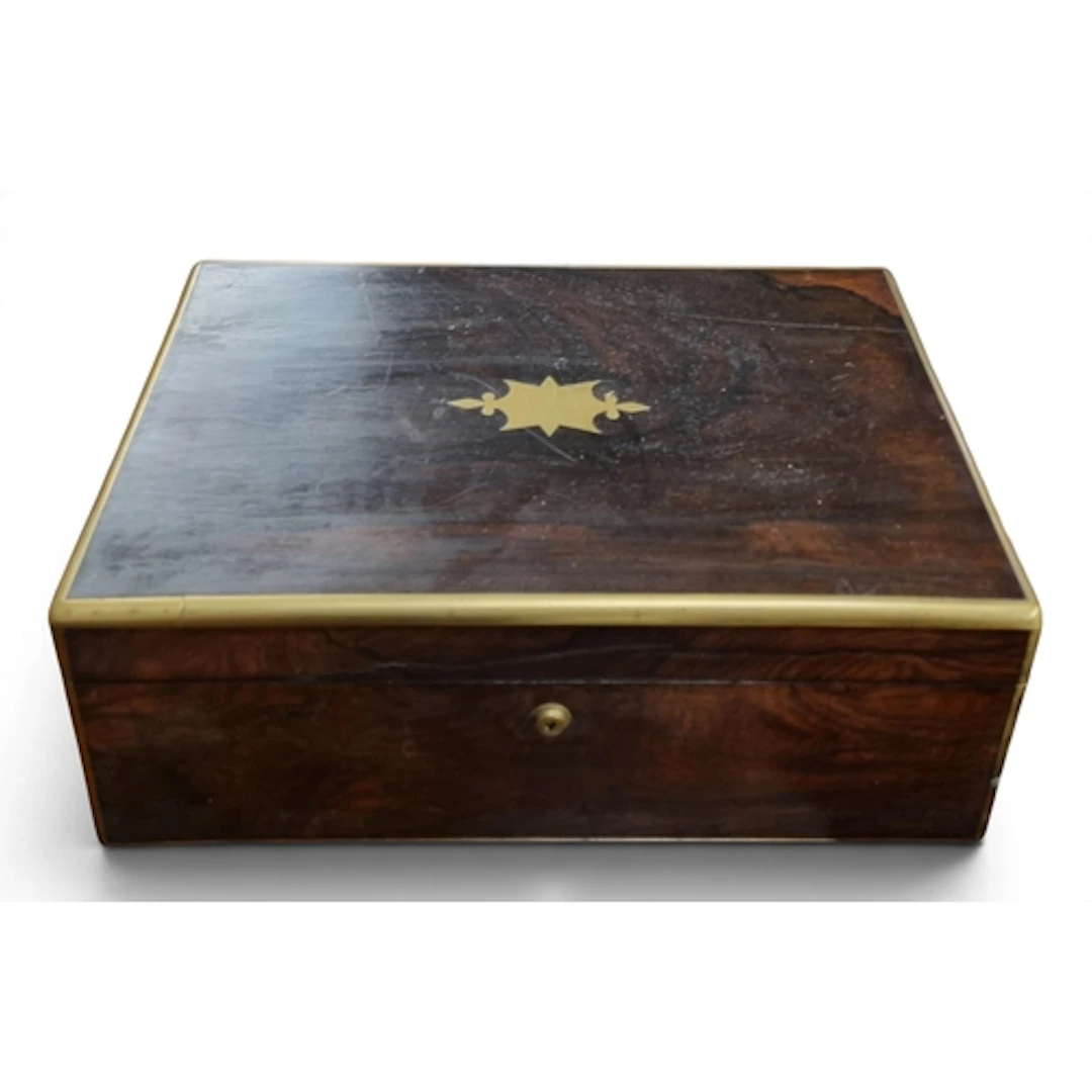 Of superb quality. A 19th Century Campaign Desk made of Maca...