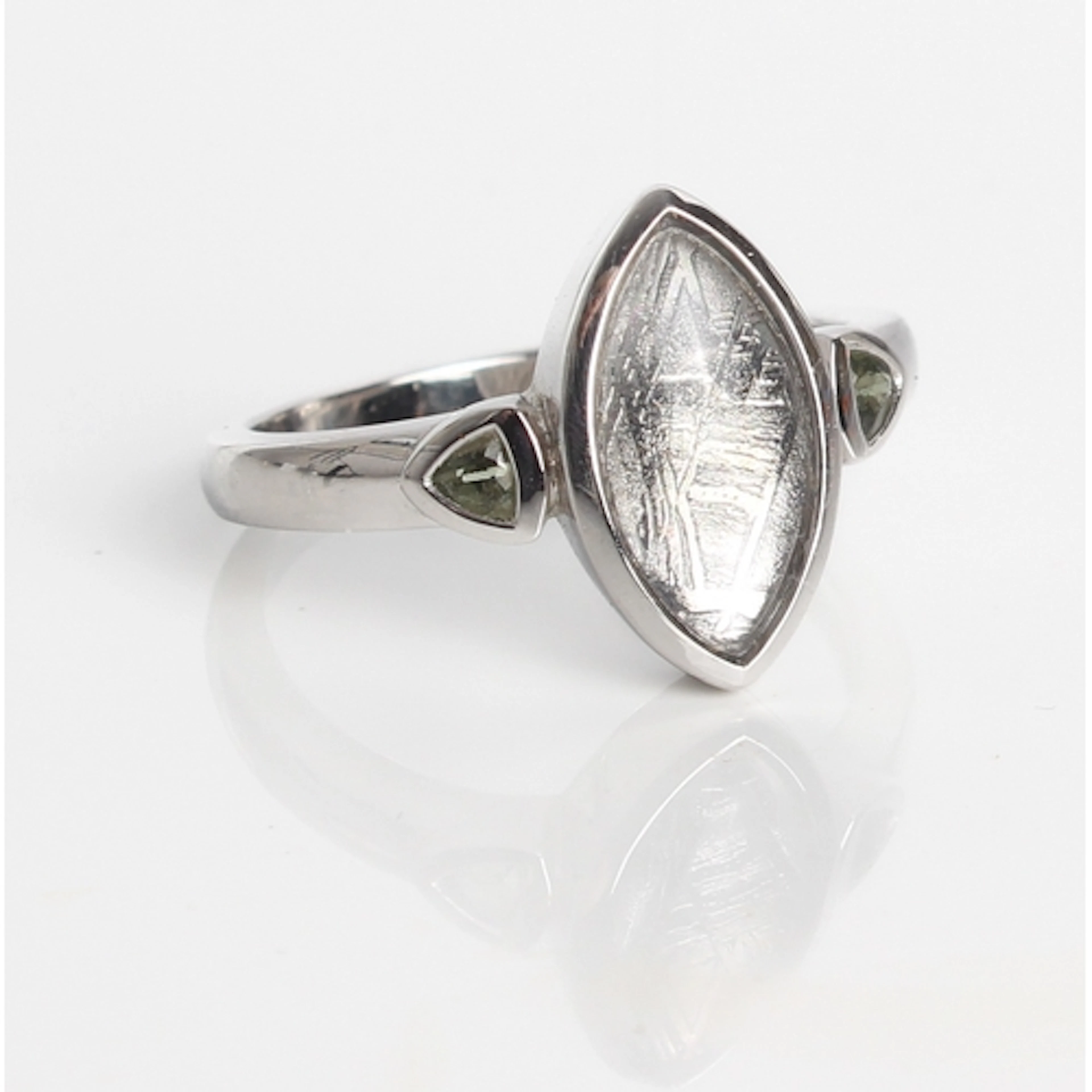 A sterling silver, muonionalusta meteorite and moldavite rin...