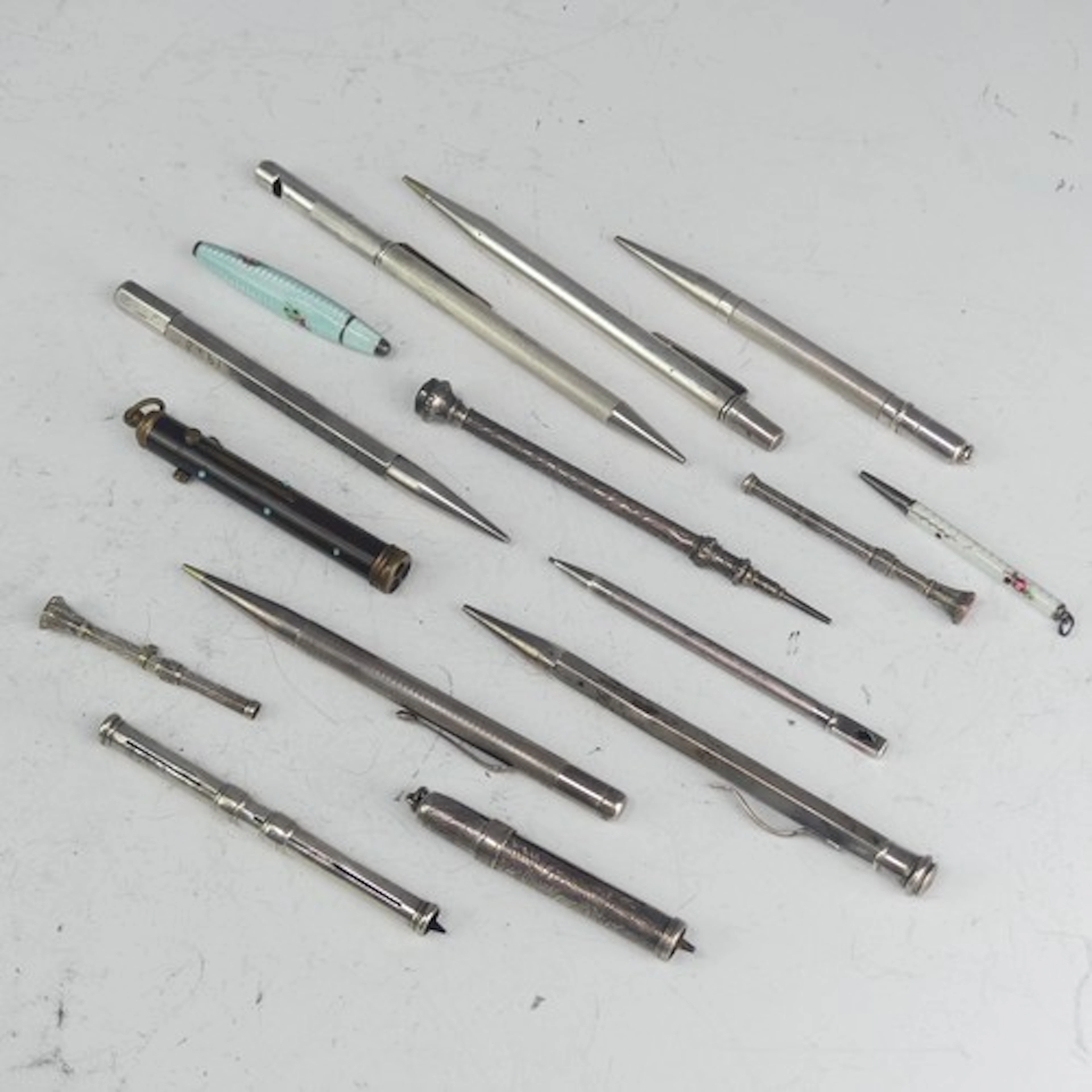 An Elizabeth II silver Propelling Pencil / Whistle, by S J R...