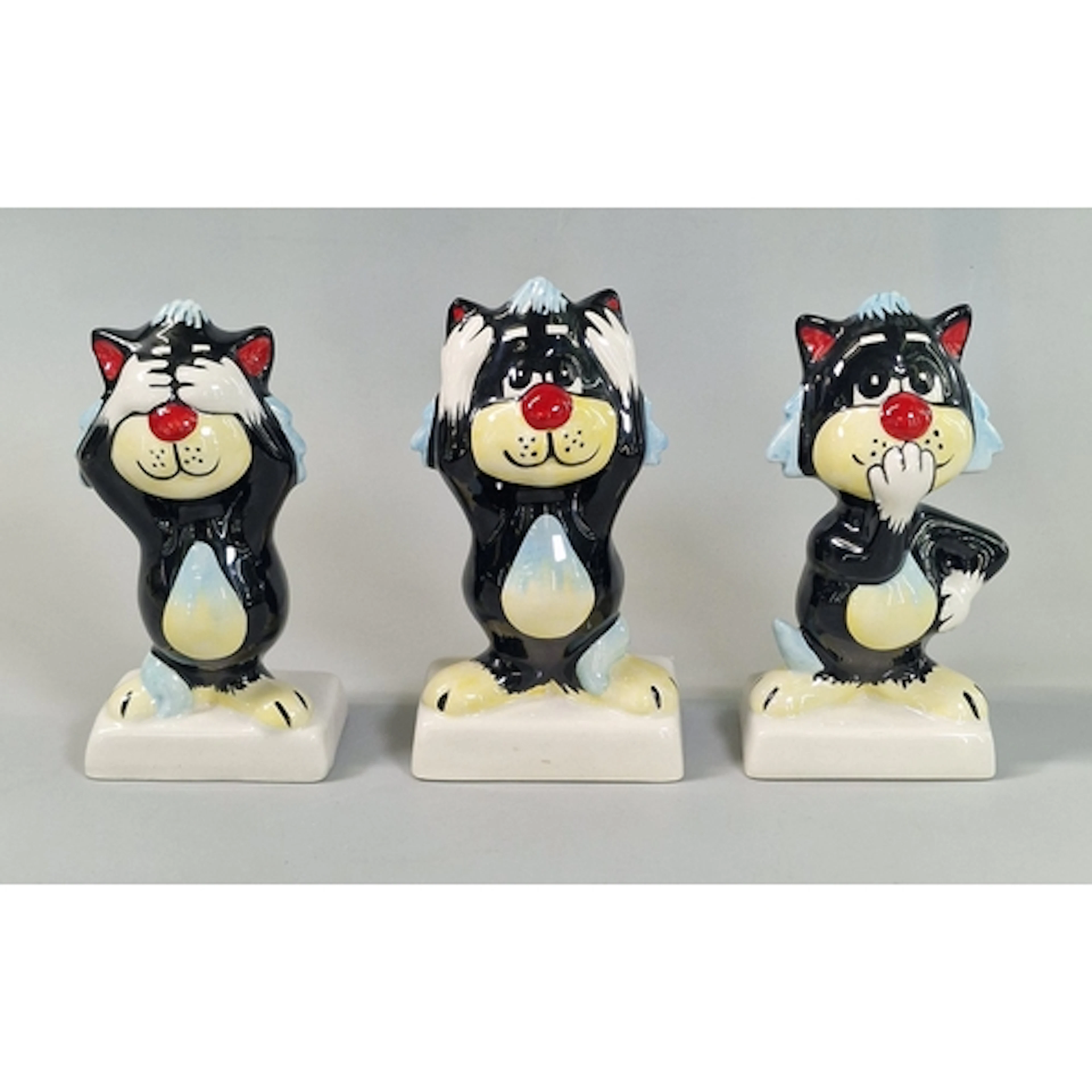 Lorna Bailey, a set of three novelty ceramic cats, 'See No E...