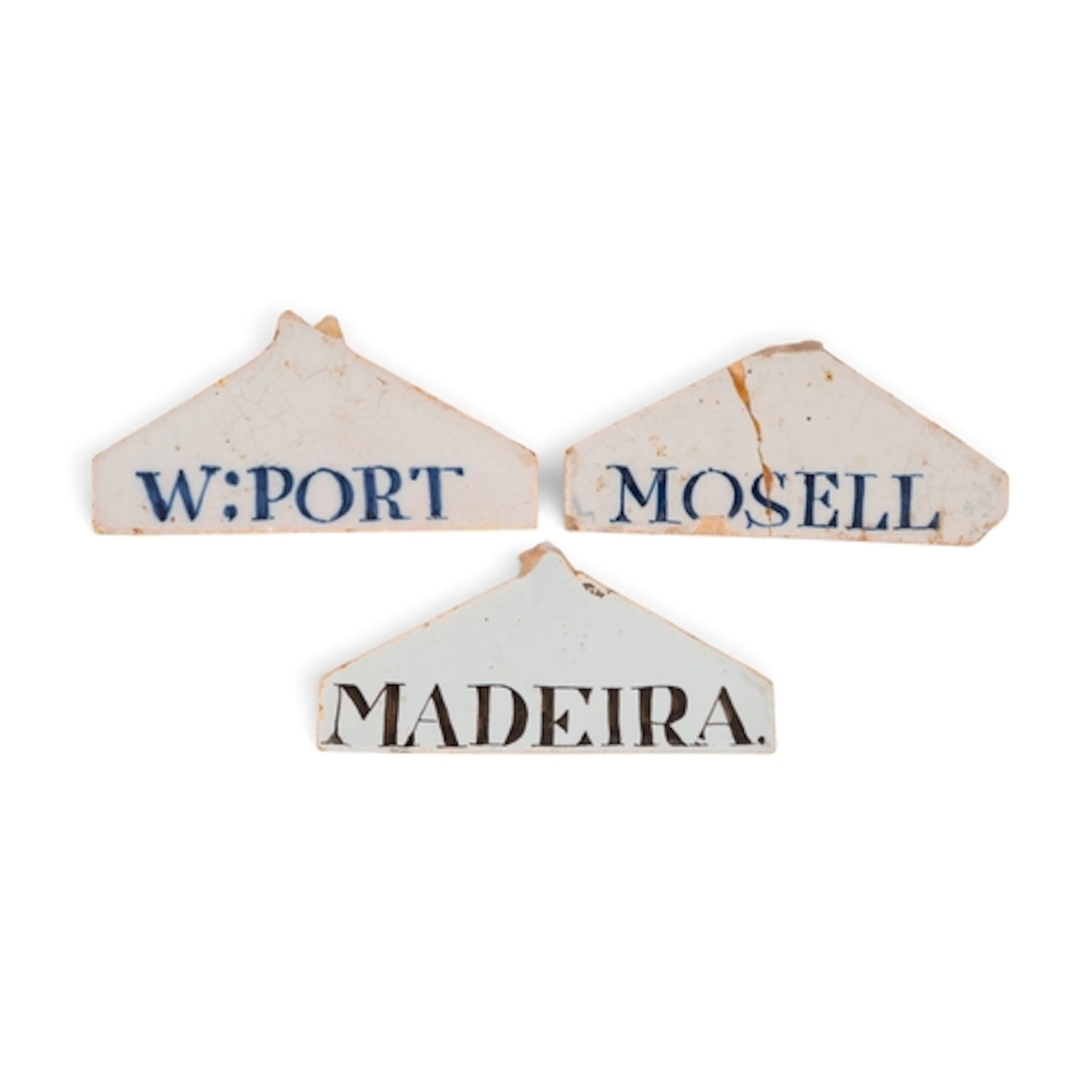 Three delftware bin labels, c.1770-90, of coathanger form, o...