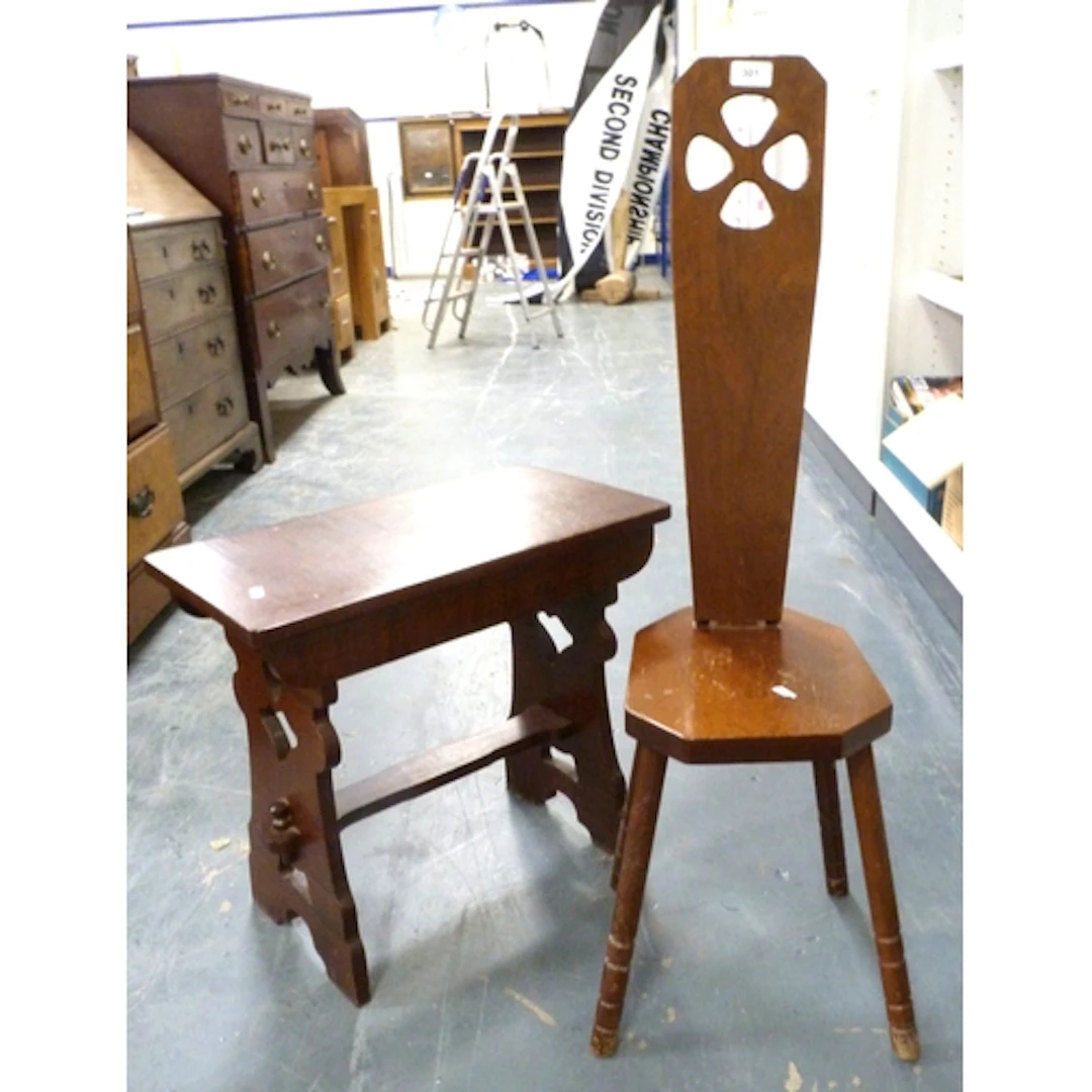 Spinning chair and a trestle end occasional table. (2)