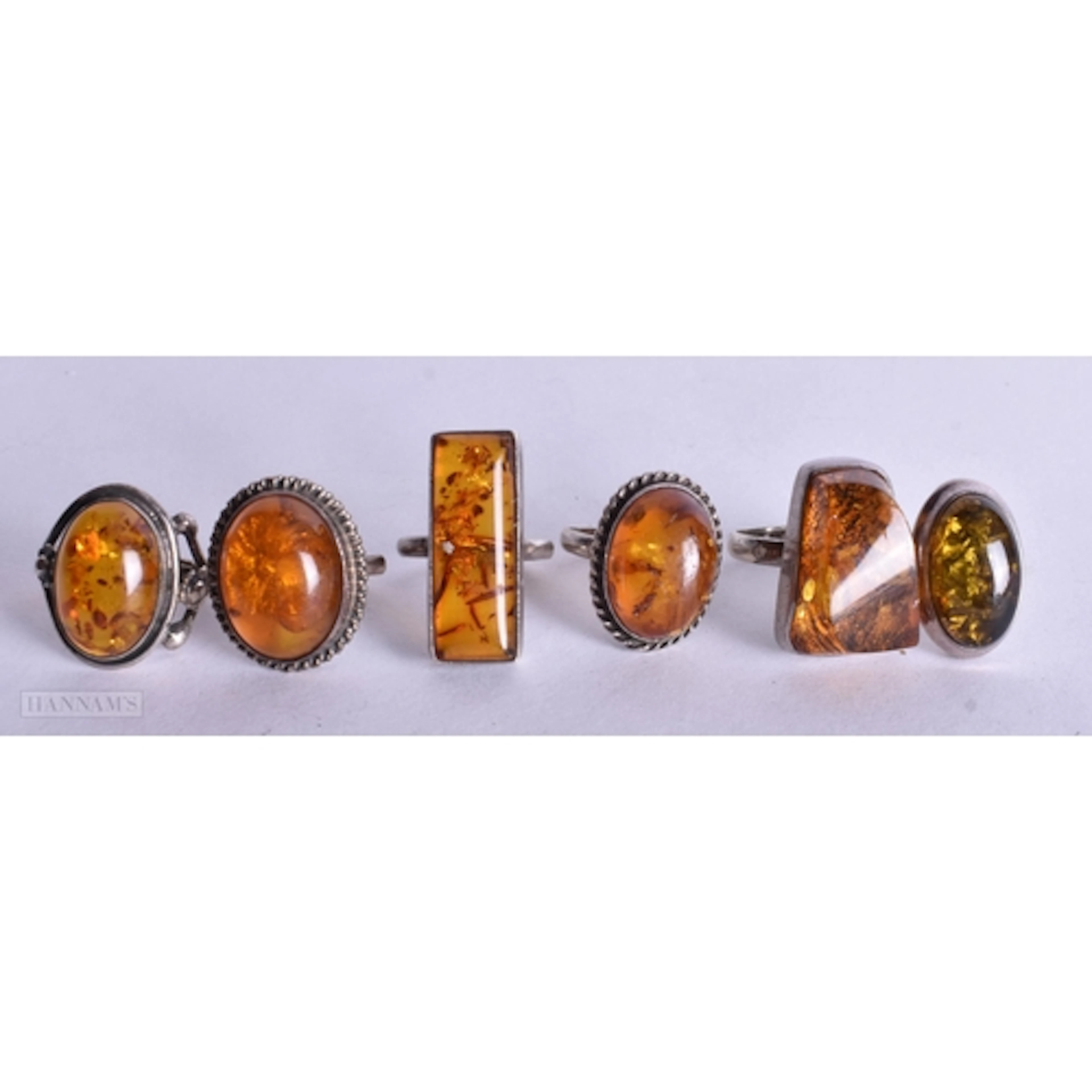 Collection of Sterling Silver Amber Rings inc. Baltic, Moder...