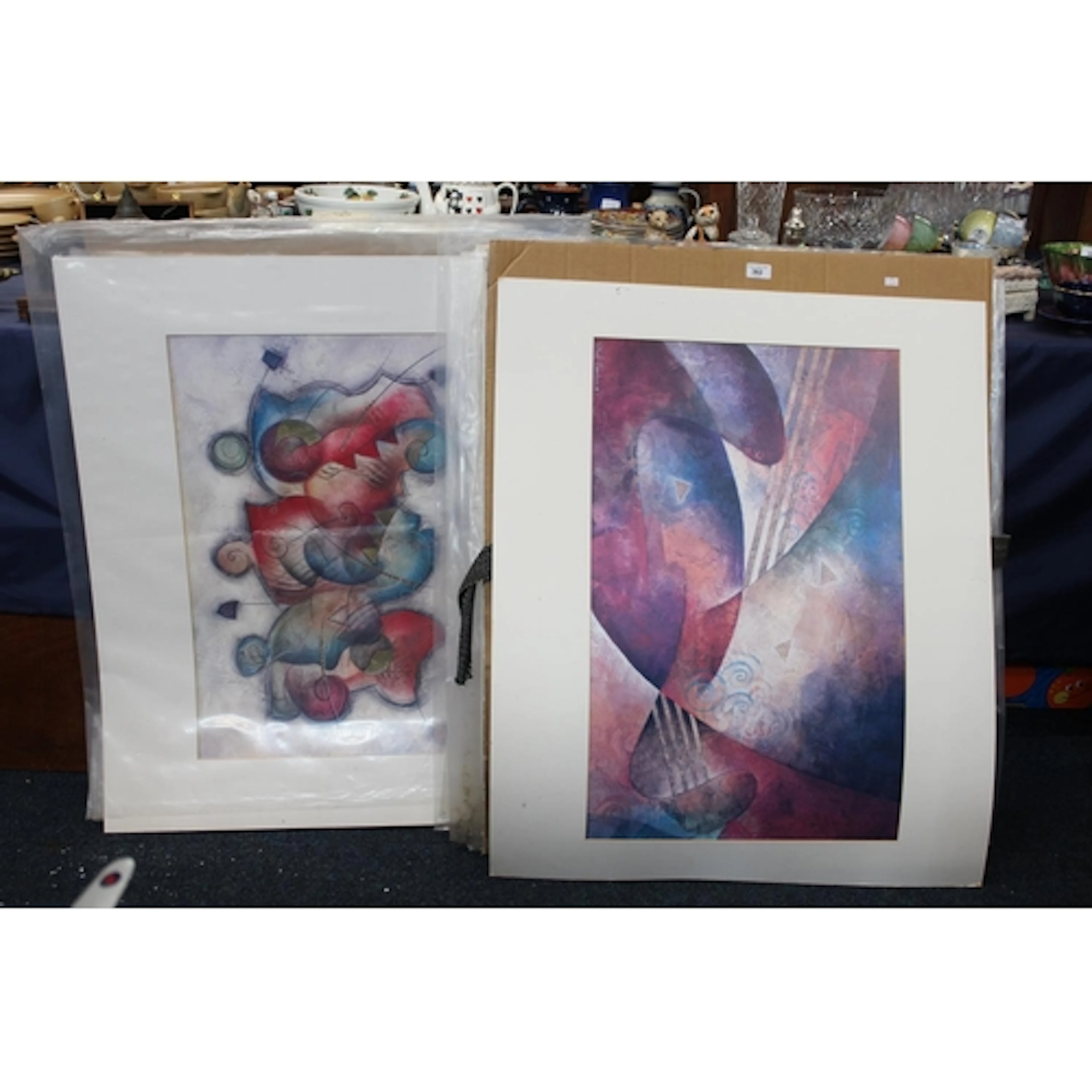 Around 20 unframed surrealist prints held over two folios. (...