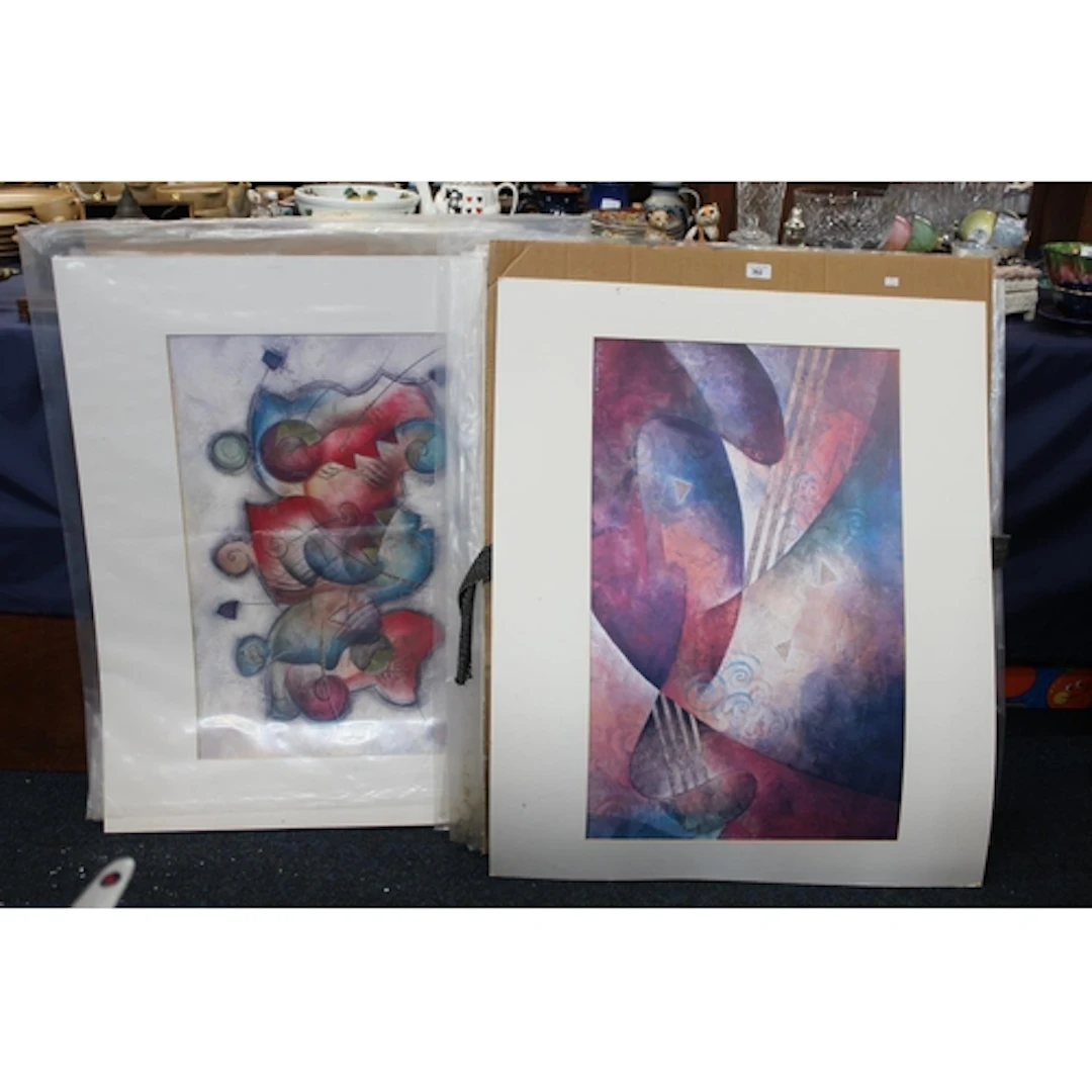 Around 20 unframed surrealist prints held over two folios. (...
