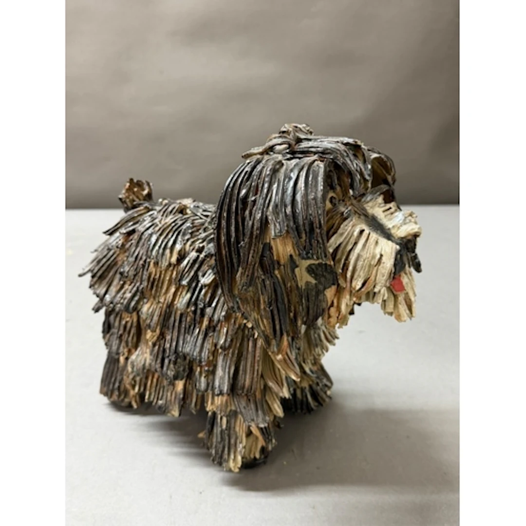 A ceramic figure of a dog