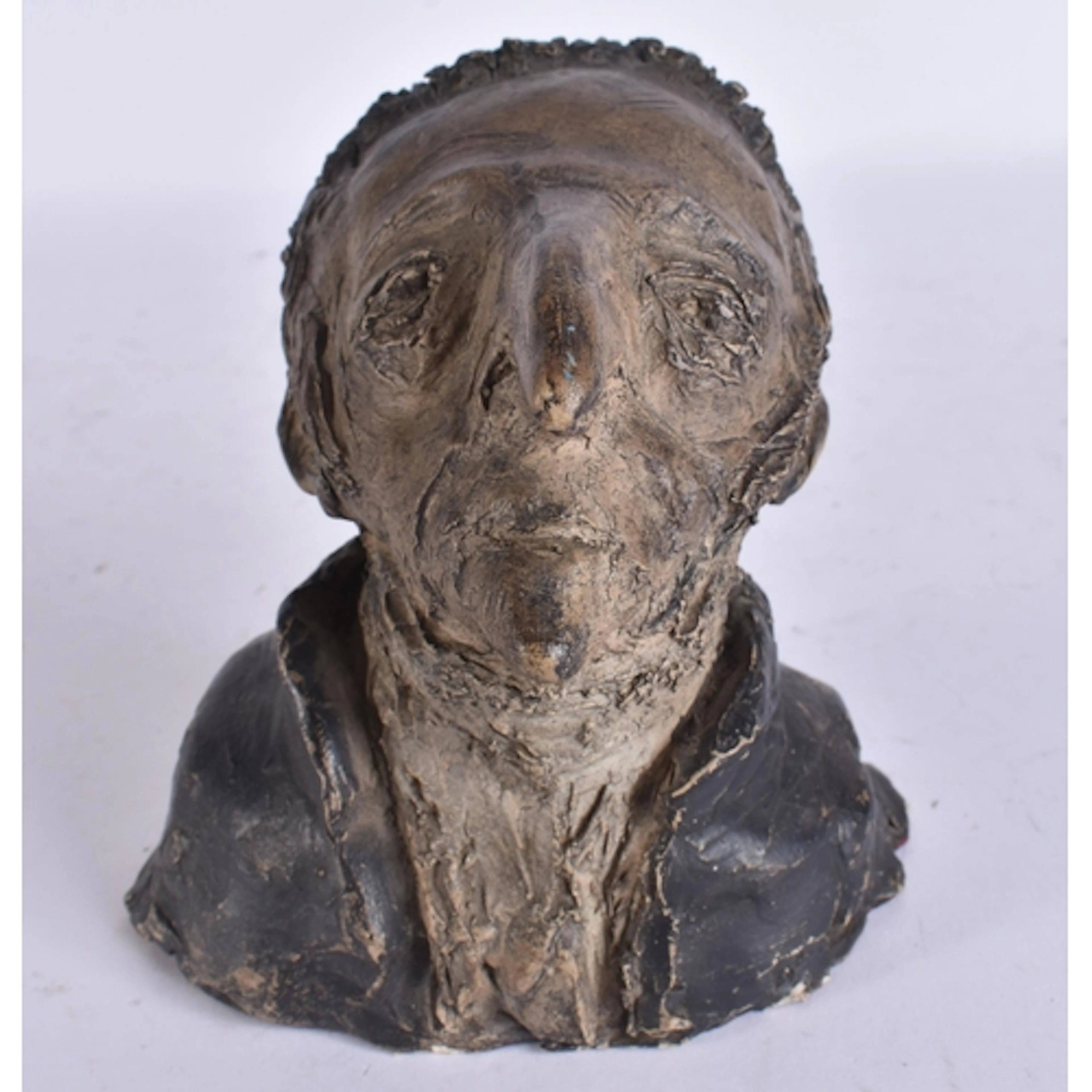 A STUDIO POTTERY BUST OF A COMPOSER. 14 cm x 8 cm.