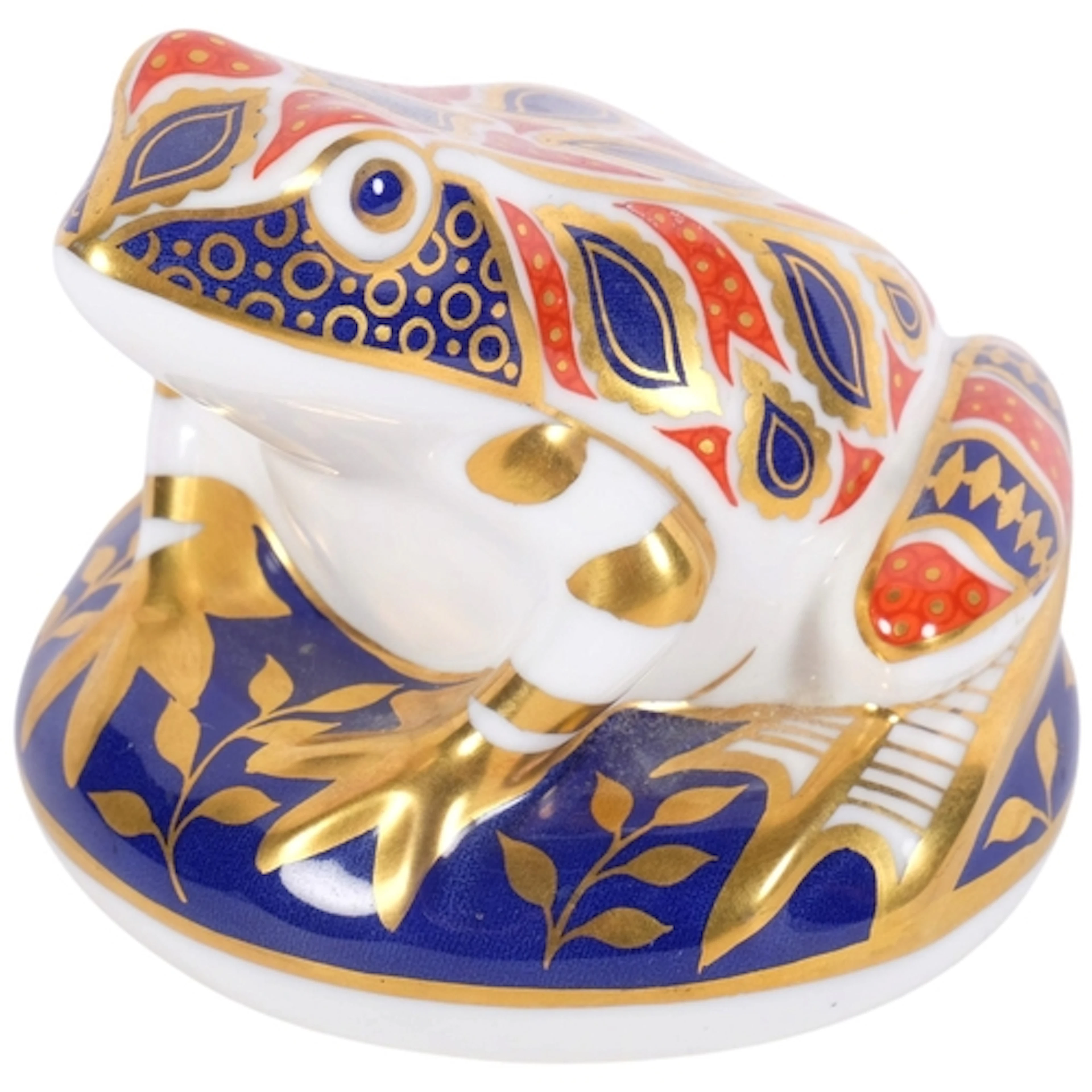 A Royal Crown Derby paperweight, in the form of a frog, silv...