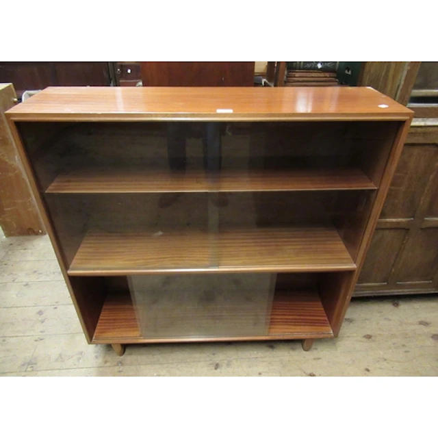 Beaver and Tapley teak glazed bookcase, with a matching bure...