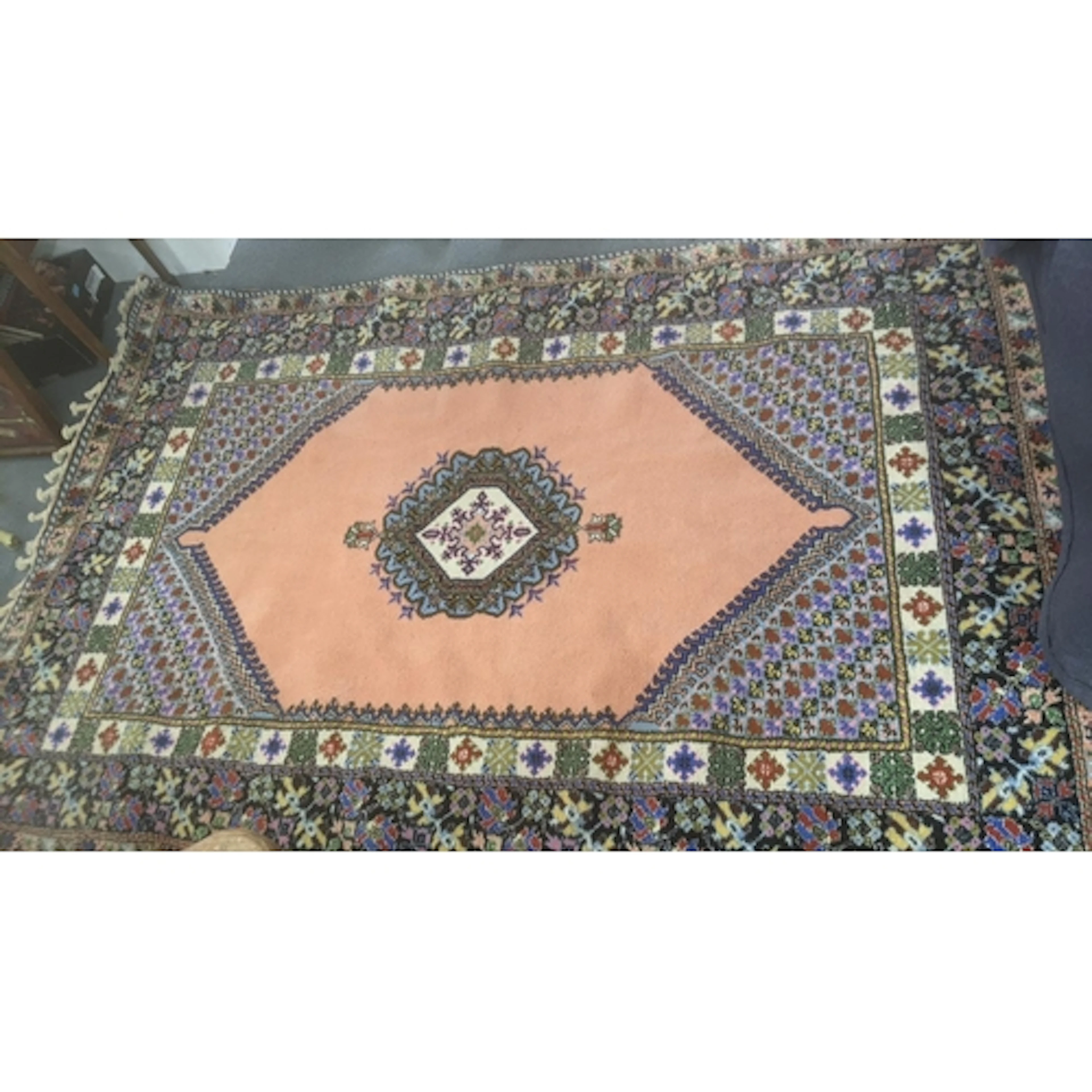 A Moroccan hand knotted Rabat rug with a central diamond on ...