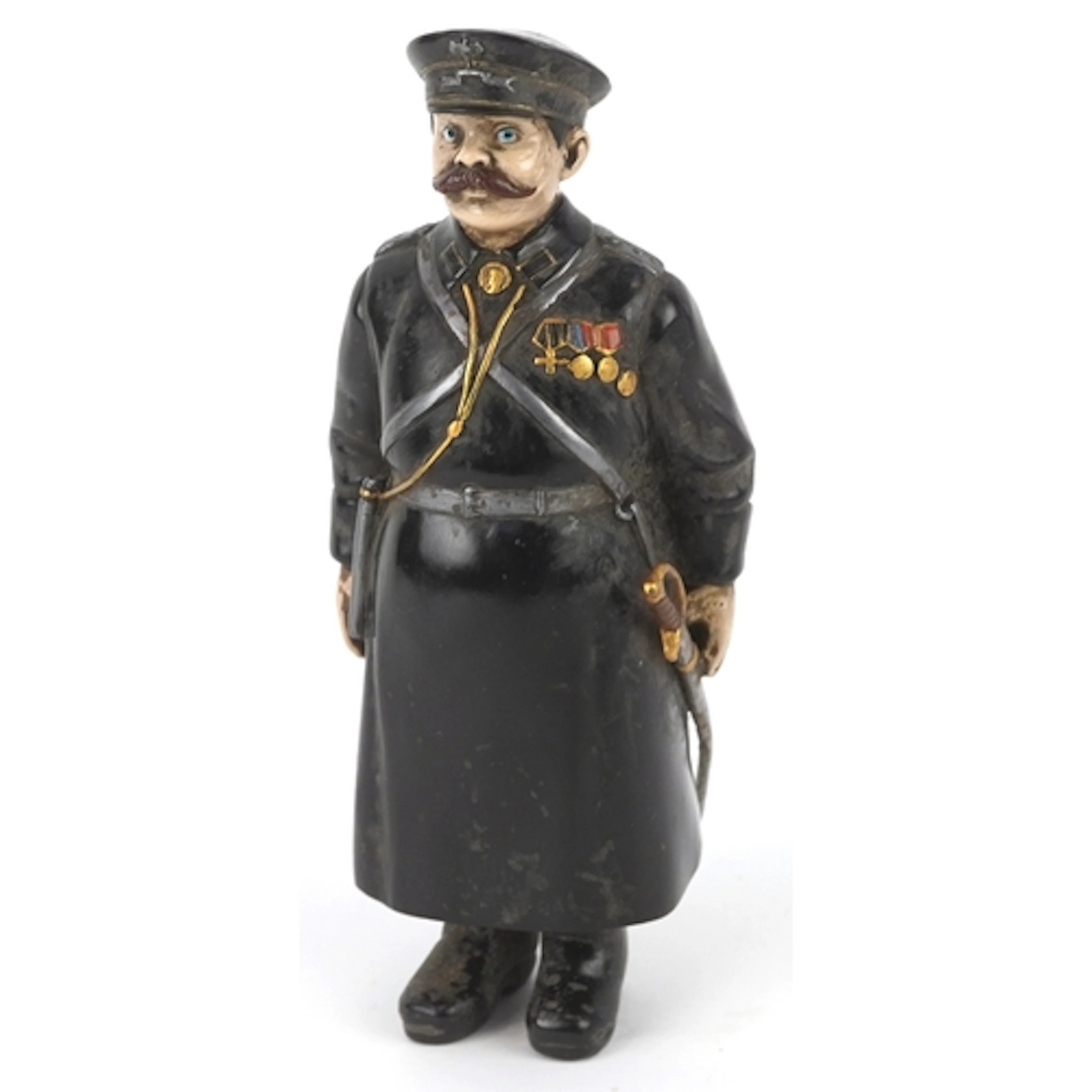 An early 20th century Russian bronze figure of a policeman a...