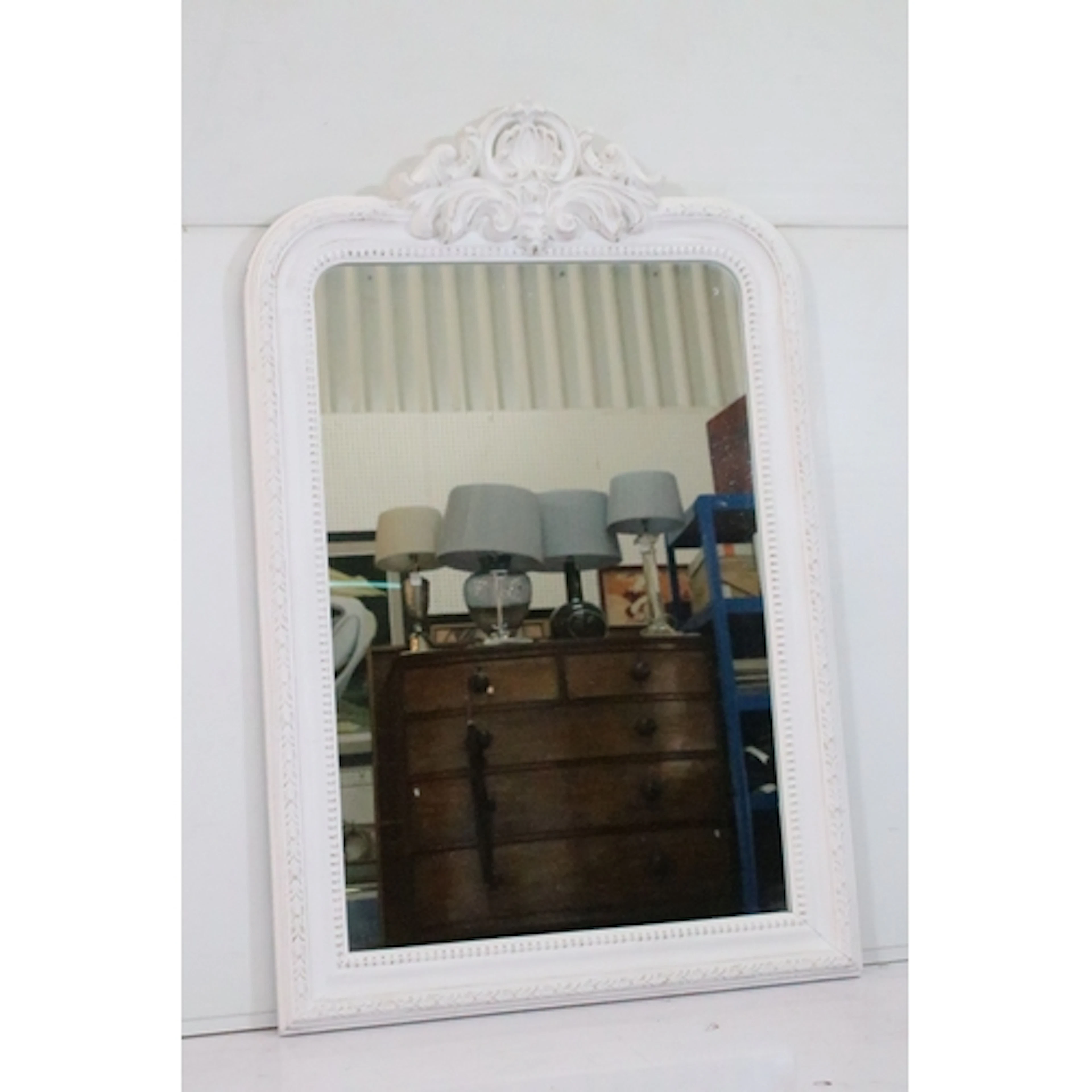 Contemporary overmantel mirror, having rounded rectangular f...