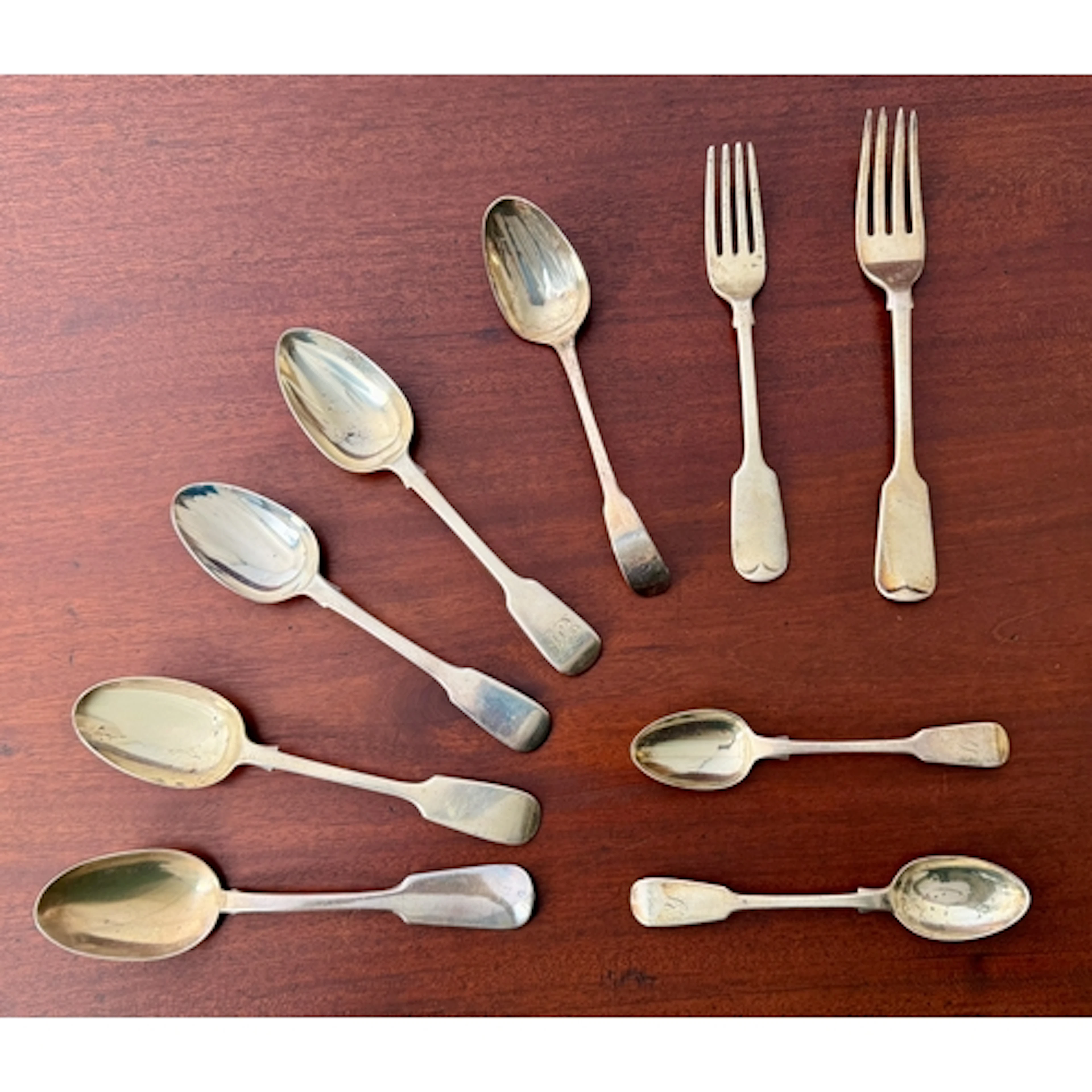 A group of silver fiddle pattern flatware - comprising a spo...