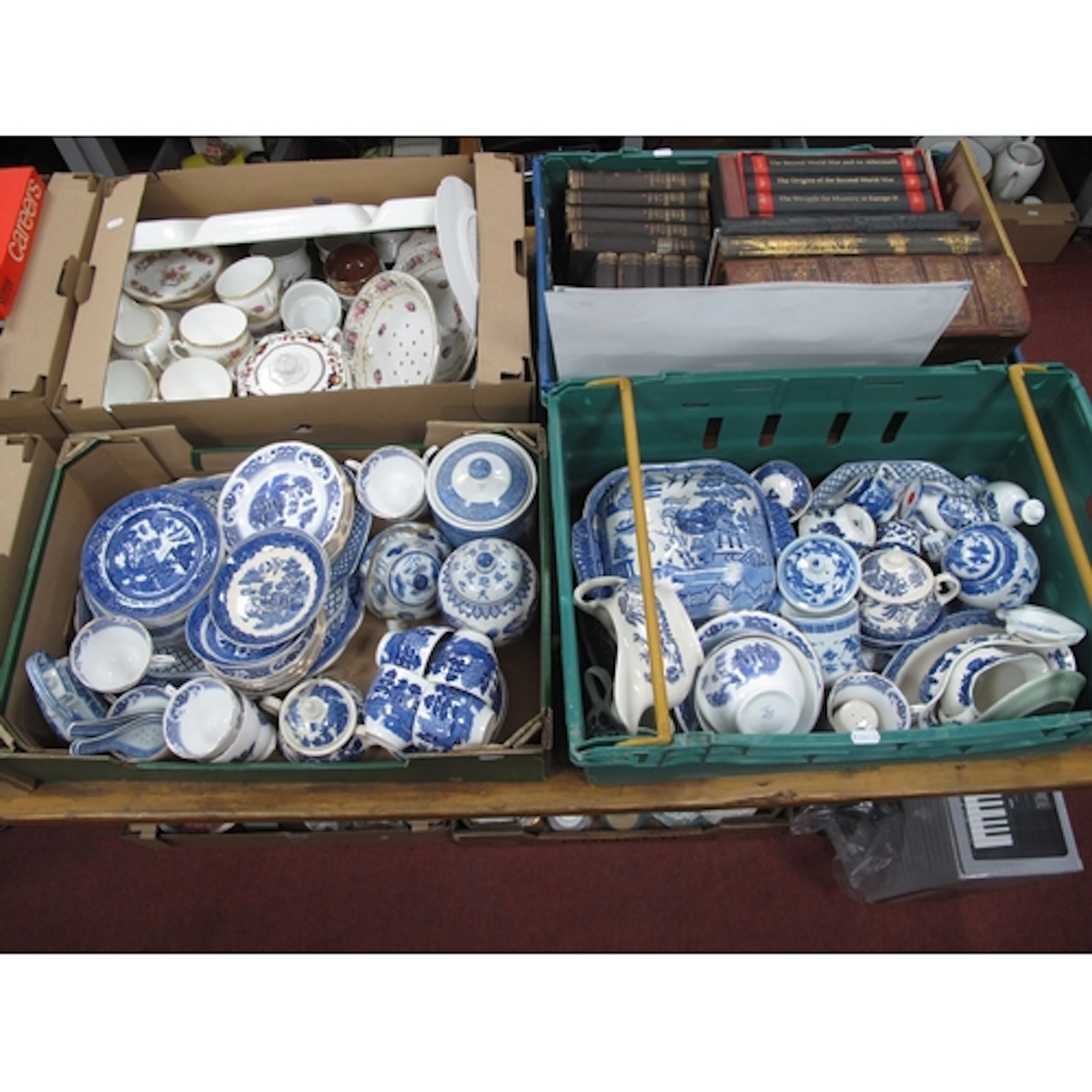 Collection of blue and white ceramics, featuring classic "Wi...