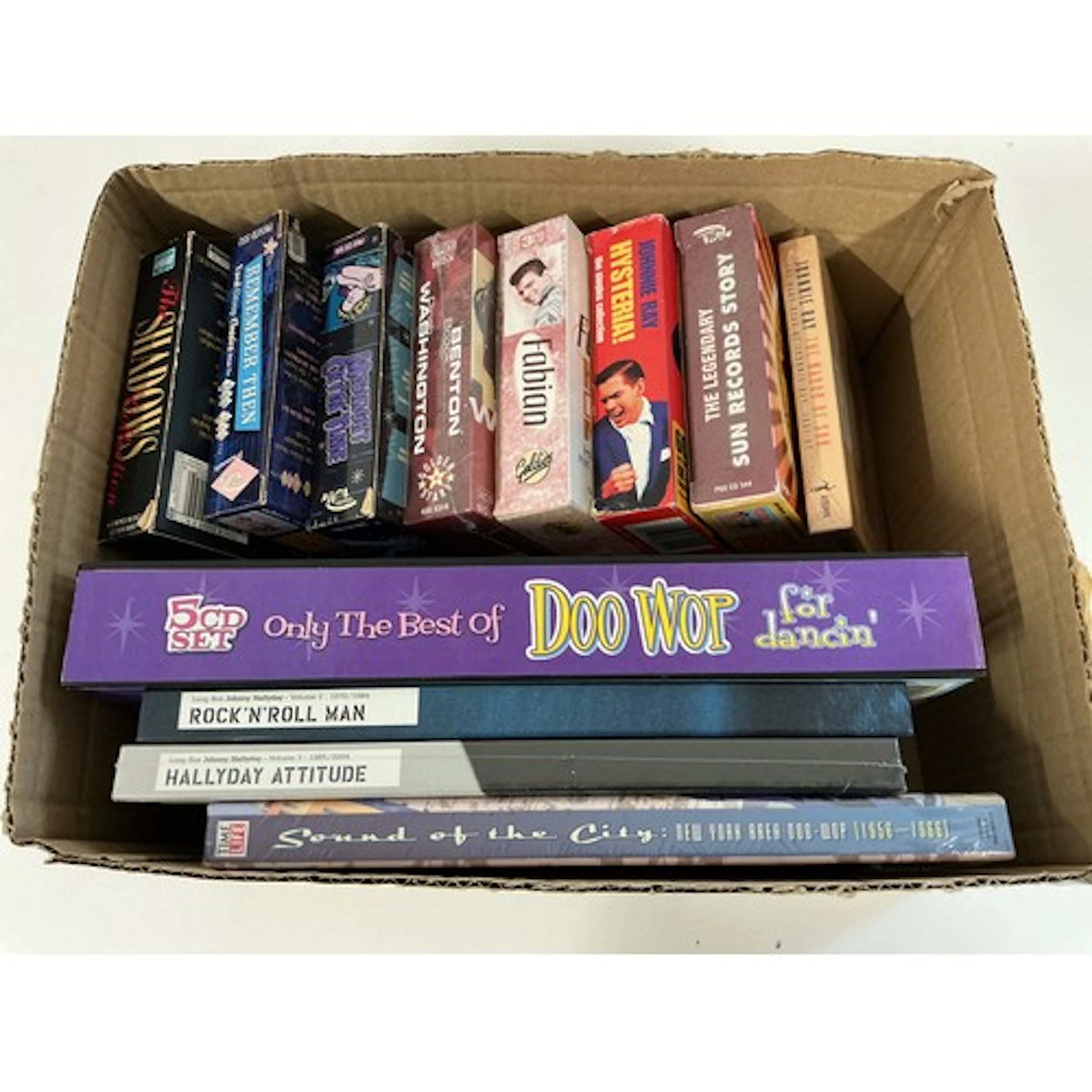 A small collection of mainly rock n roll CD box sets, some s...