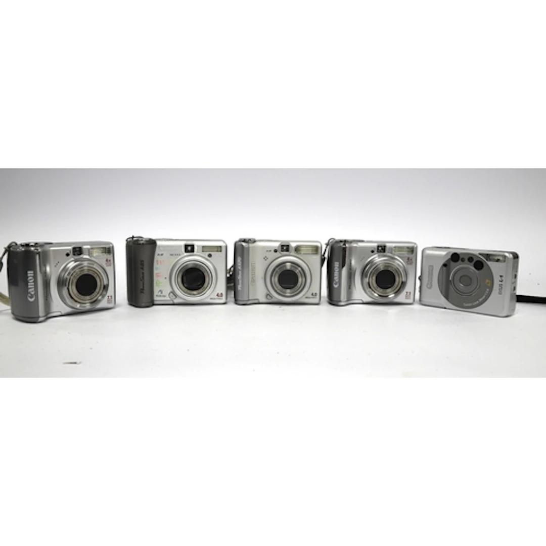 Canon PowerShot Digital Compact Cameras to include two A560,...