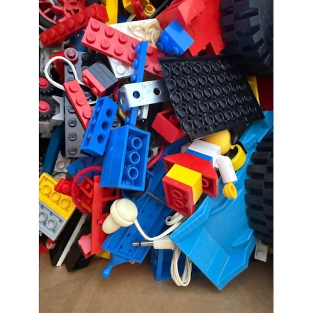 A selection of Vinatge LEGO and manuals.
