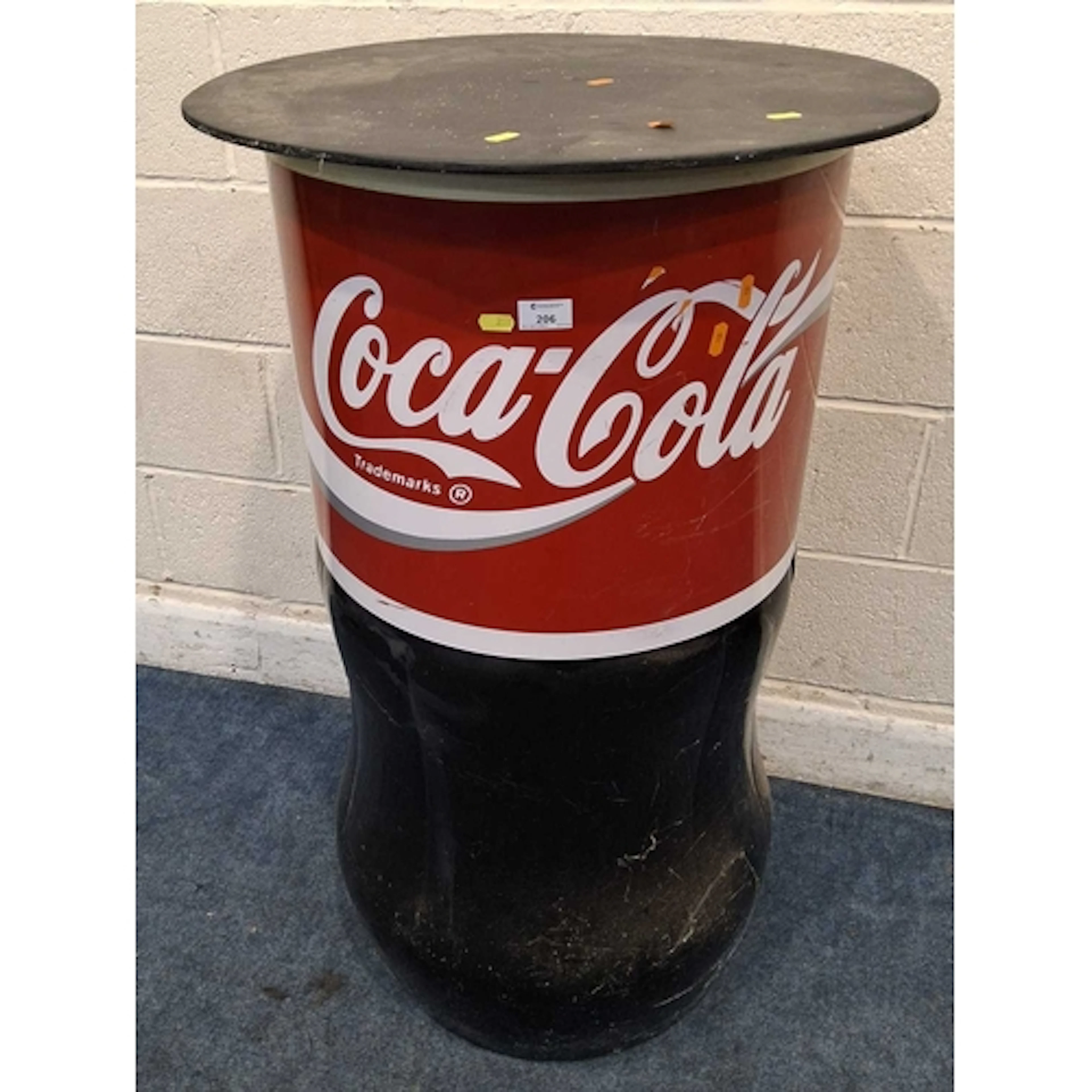 A PLASTIC COCA-COLA COOLER, with a later wooden surface (di...