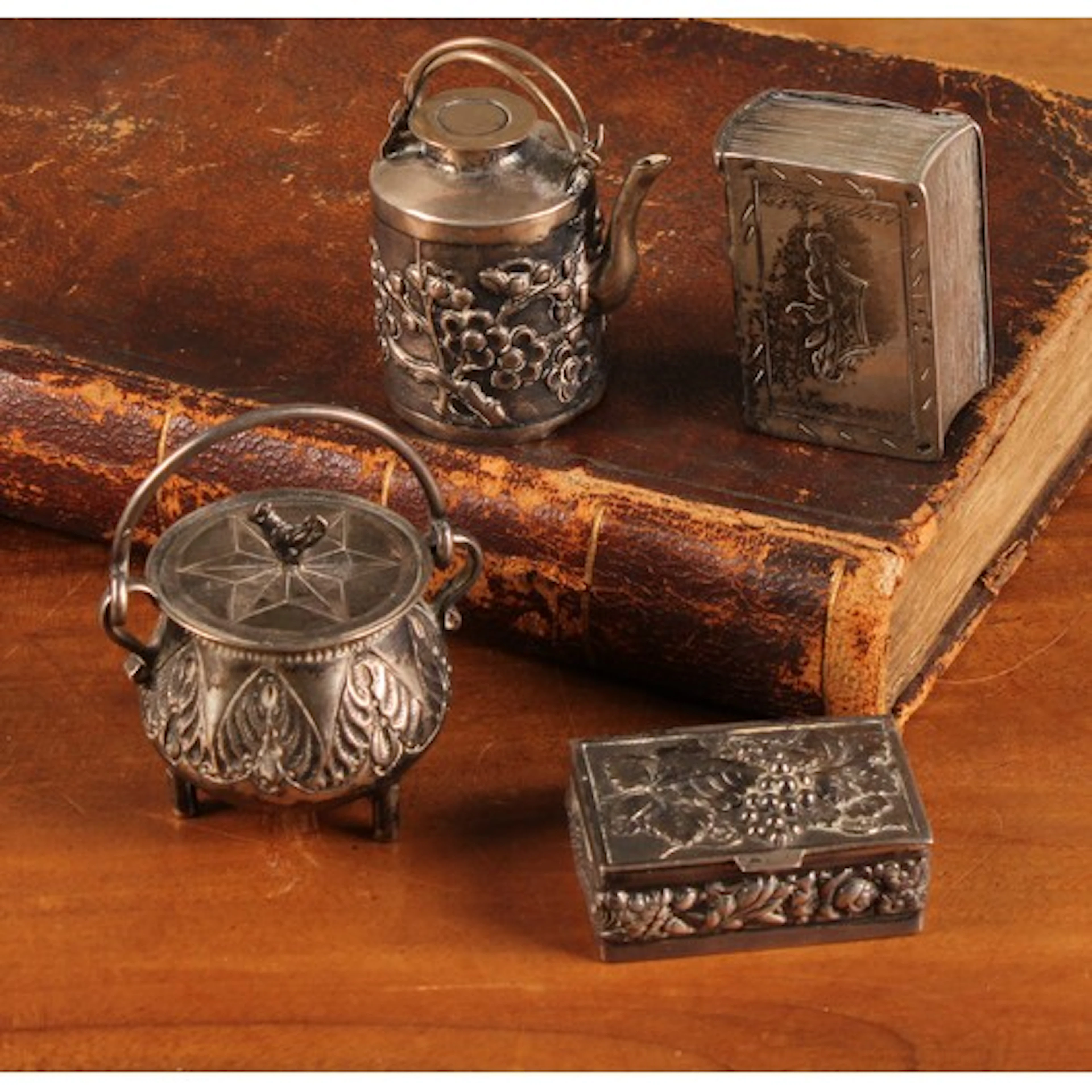 A 19th century continental silver miniature tripod cauldron,...