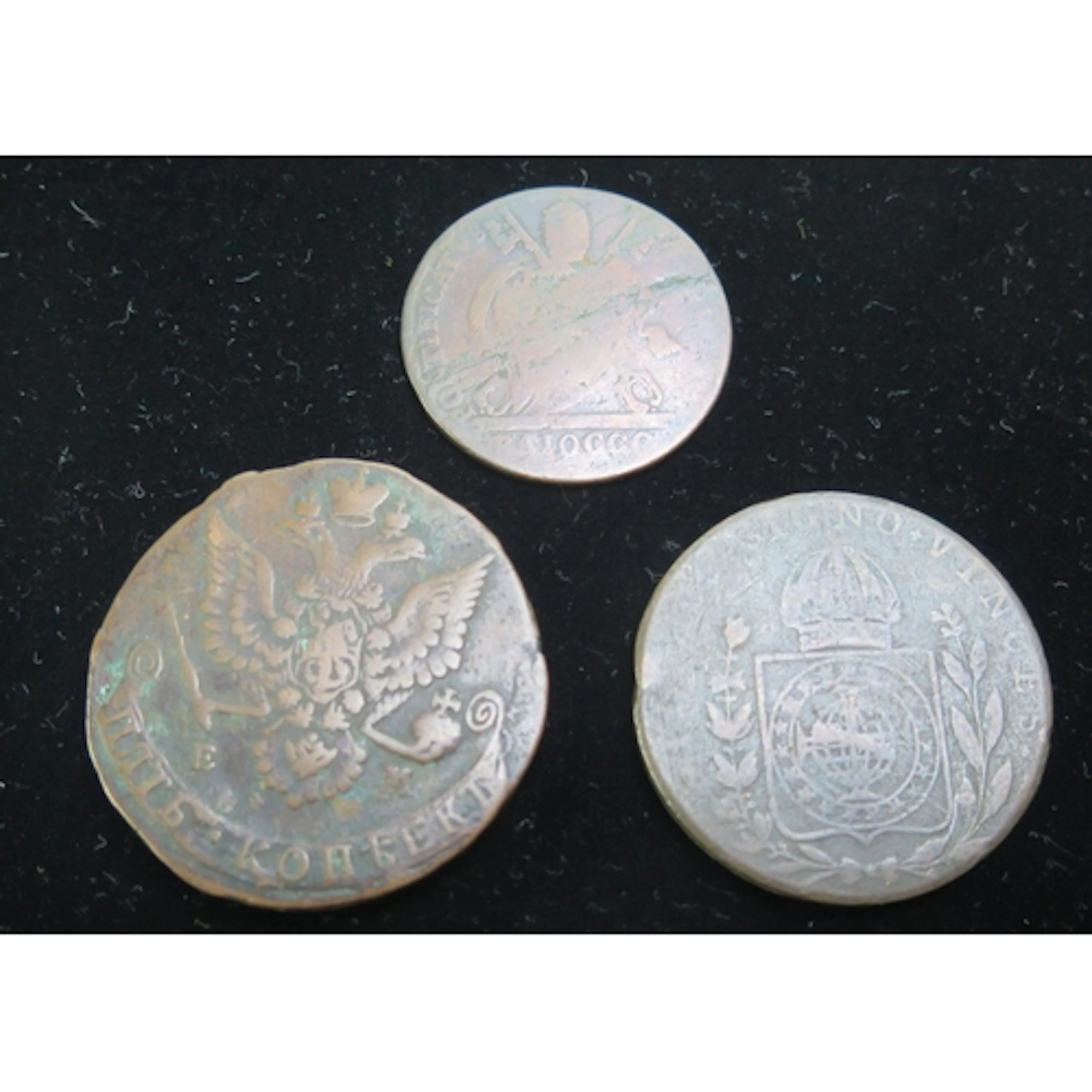 Russia 1780 5 Kopeks, Brazil 80 Reiss and one other coin