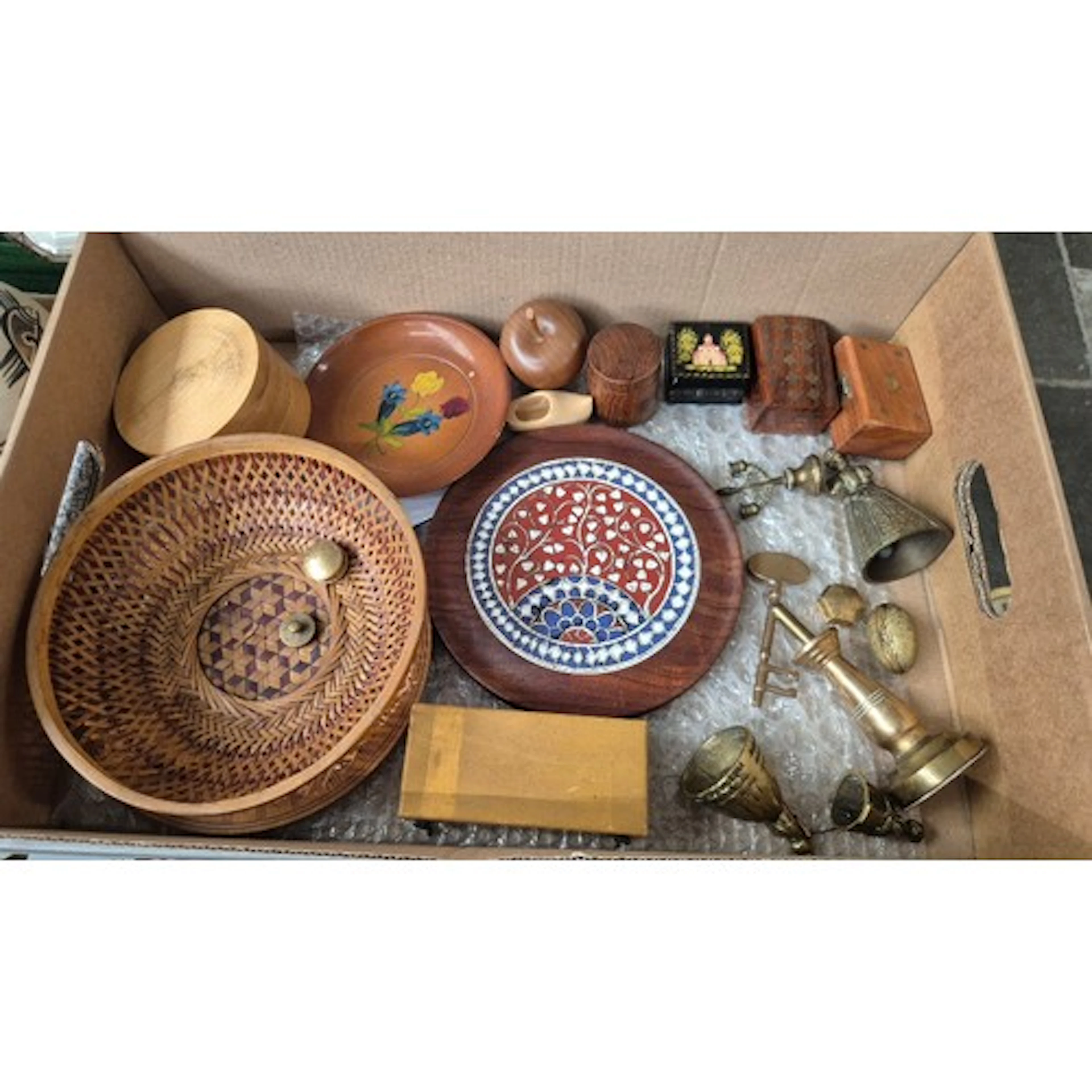A box of treen and collectables to include carved plates, wi...