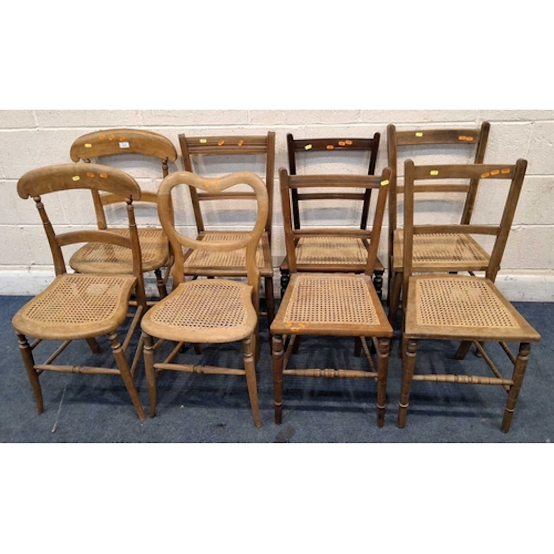 EIGHT CANE SEATED CHAIRS, all frames varying in shape, size,...