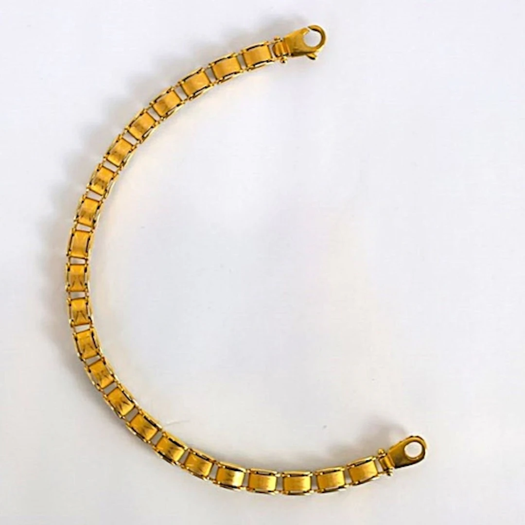 A contemporary Italian 9ct gold bracelet, the openwork desig...