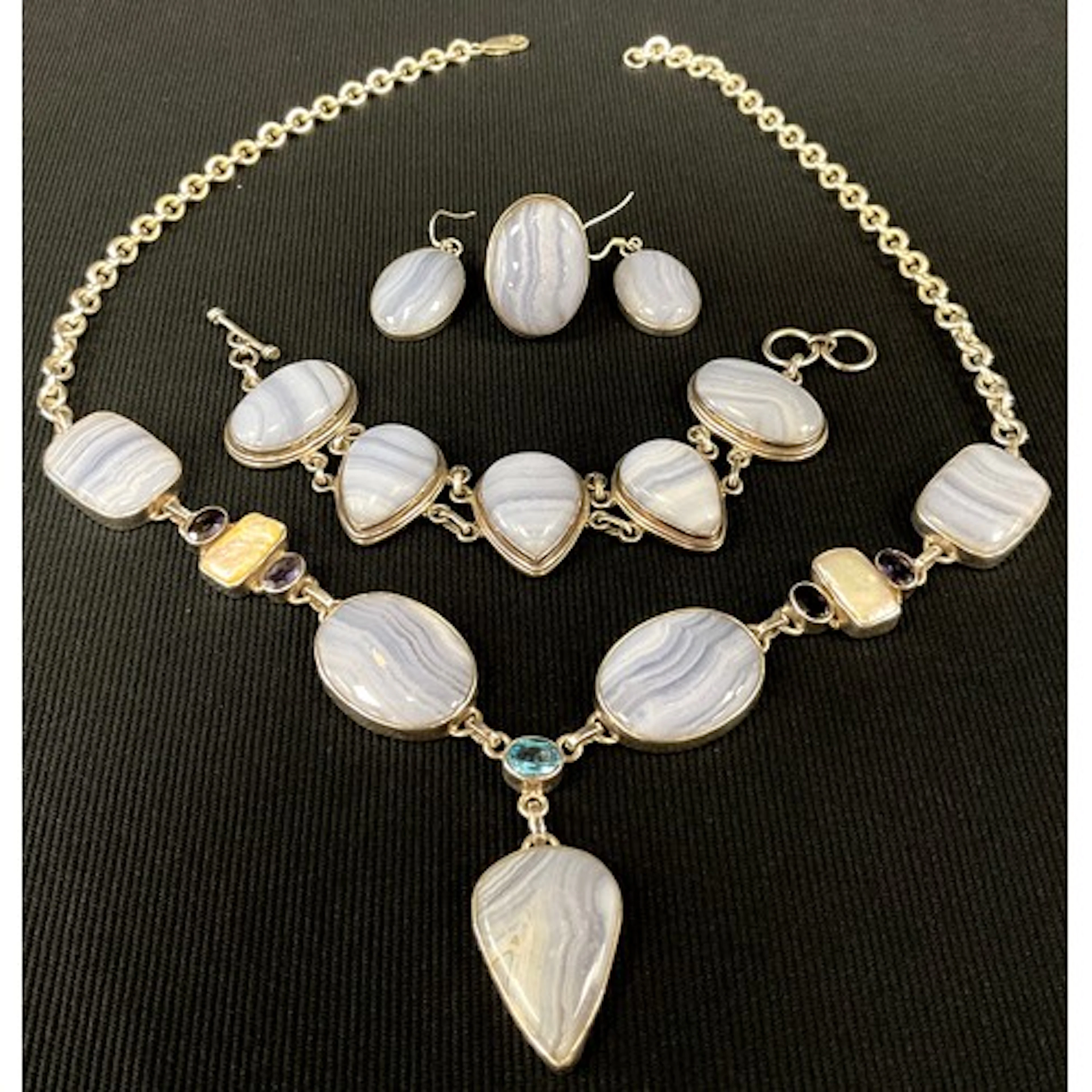 A silver and pale blue banded agate, amethyst and blister pe...