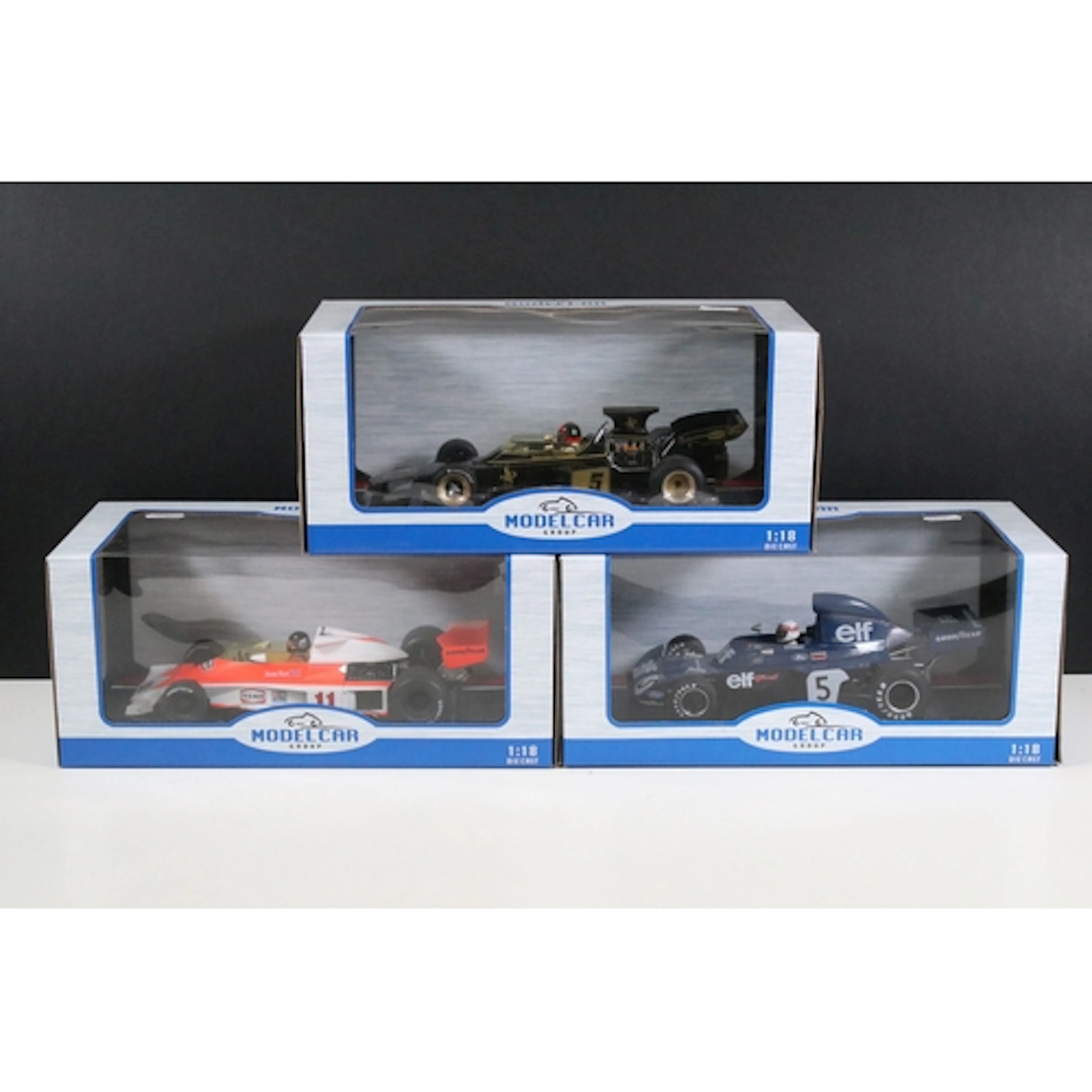 Three boxed 1/18 Model Car Group diecast F1 models to includ...