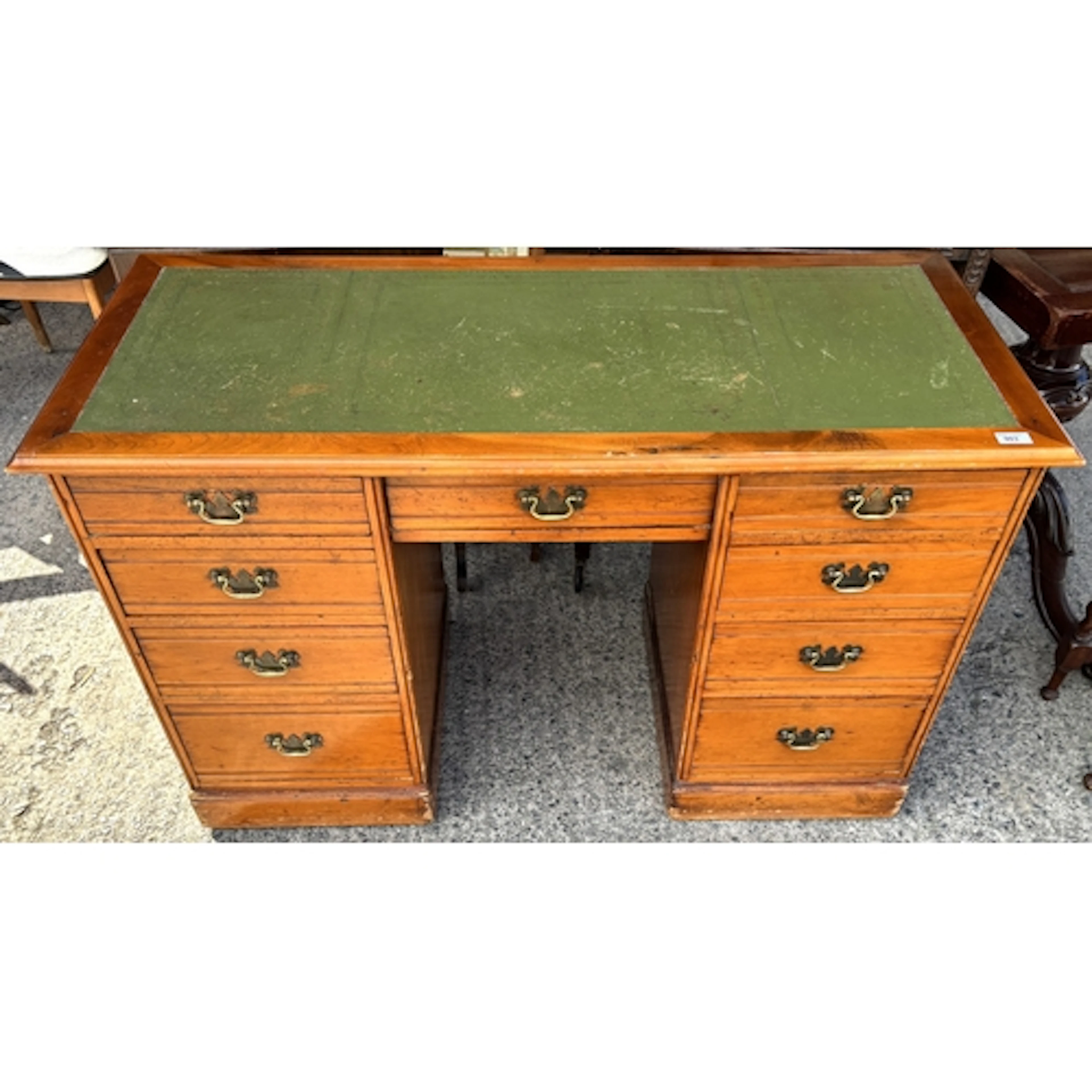 A Victorian pine 9 drawer desk with refurbished top and gree...