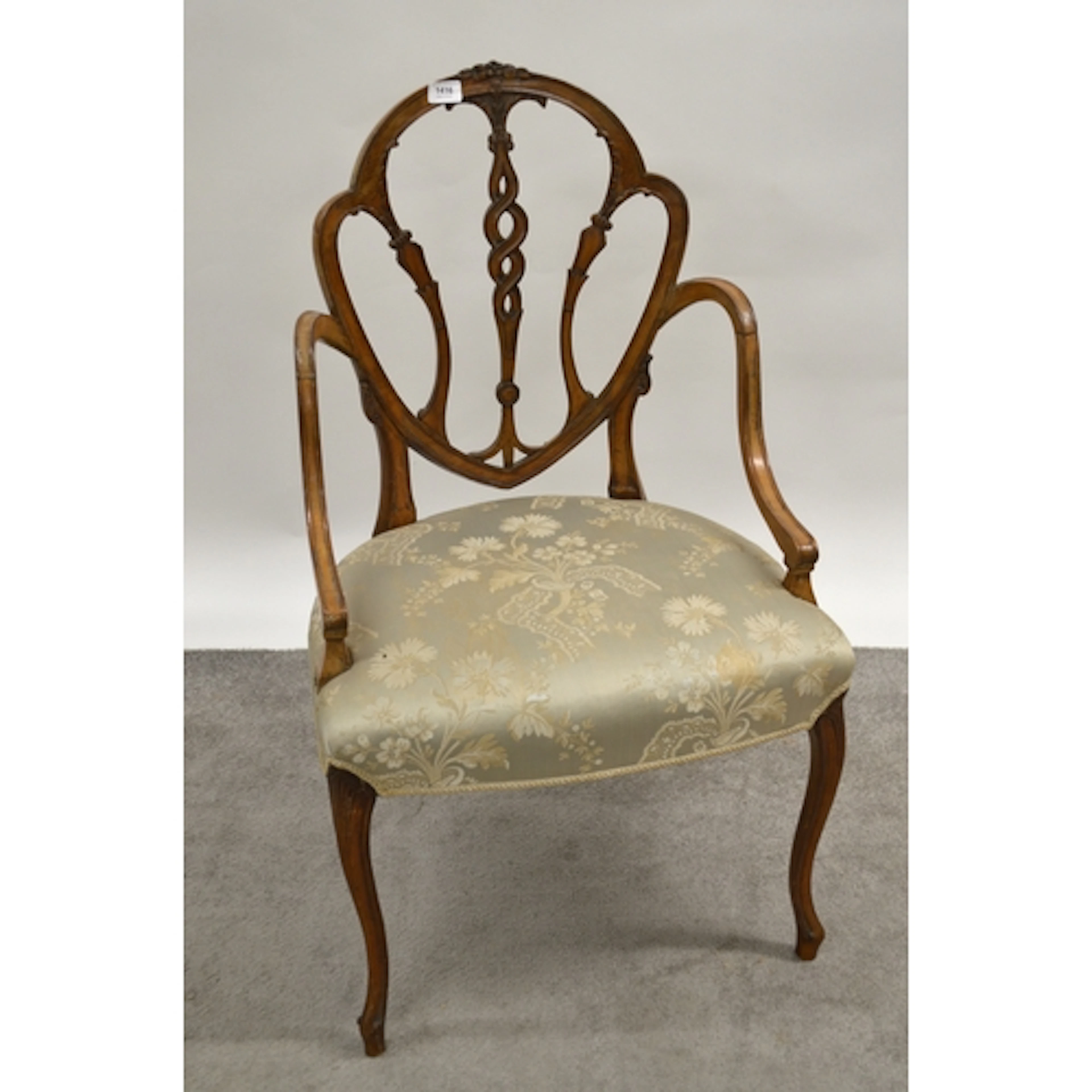 Pair of carved mahogany open armchairs, on cabriole front su...