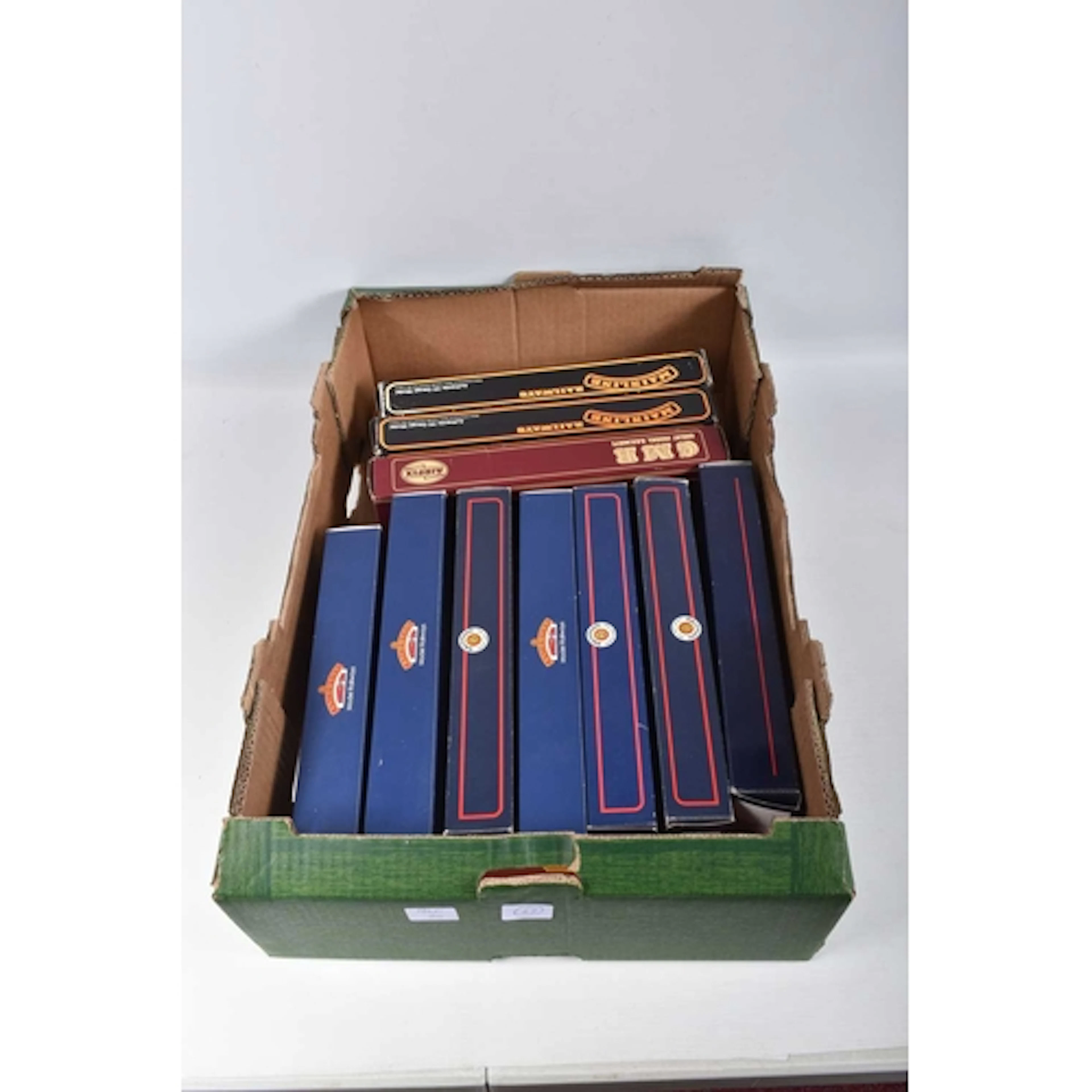 TWELVE BOXED OO GAUGE MODEL RAILWAY COACHES BY HORNBY, BACHM...