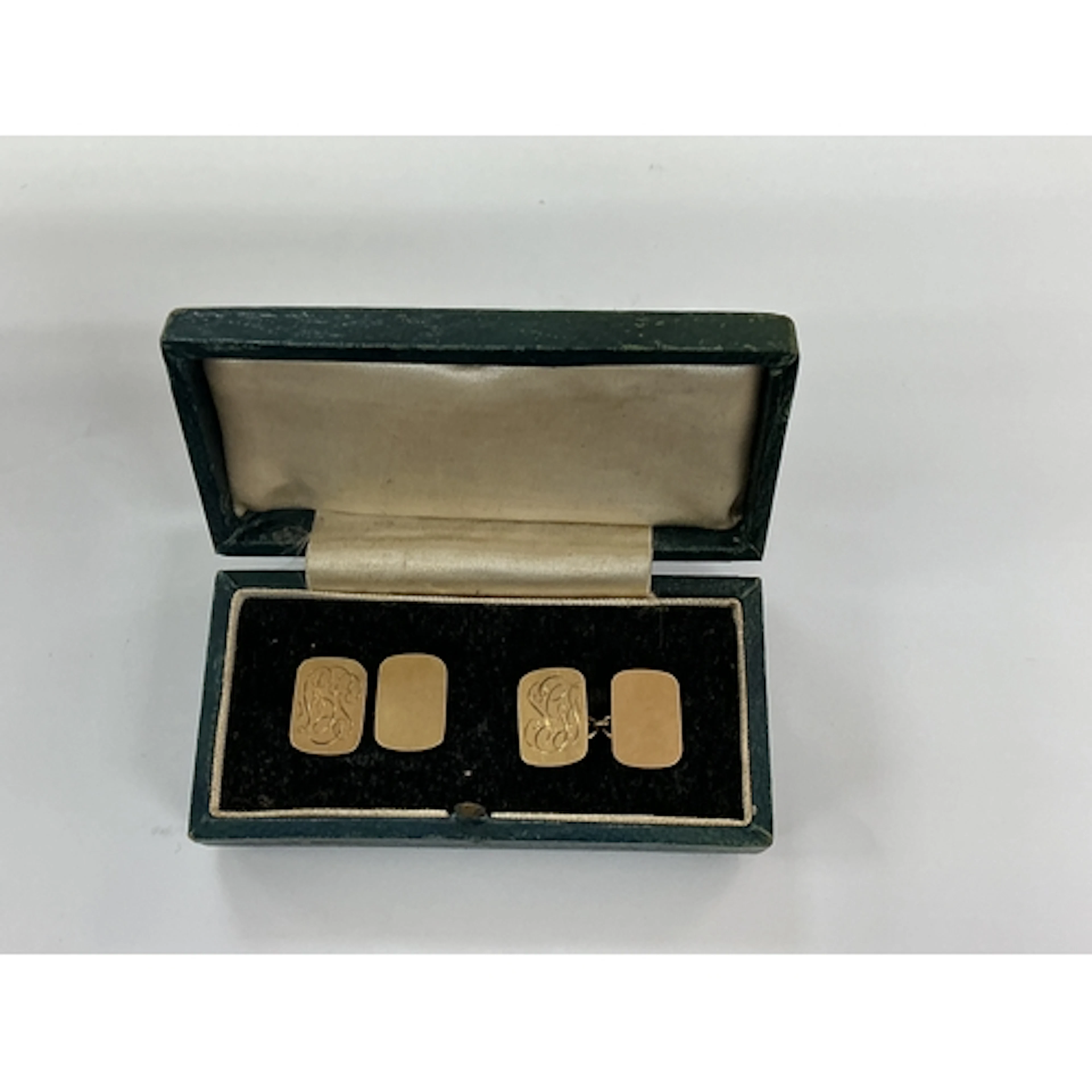 A cased set of 9ct gold cufflinks, engraved.