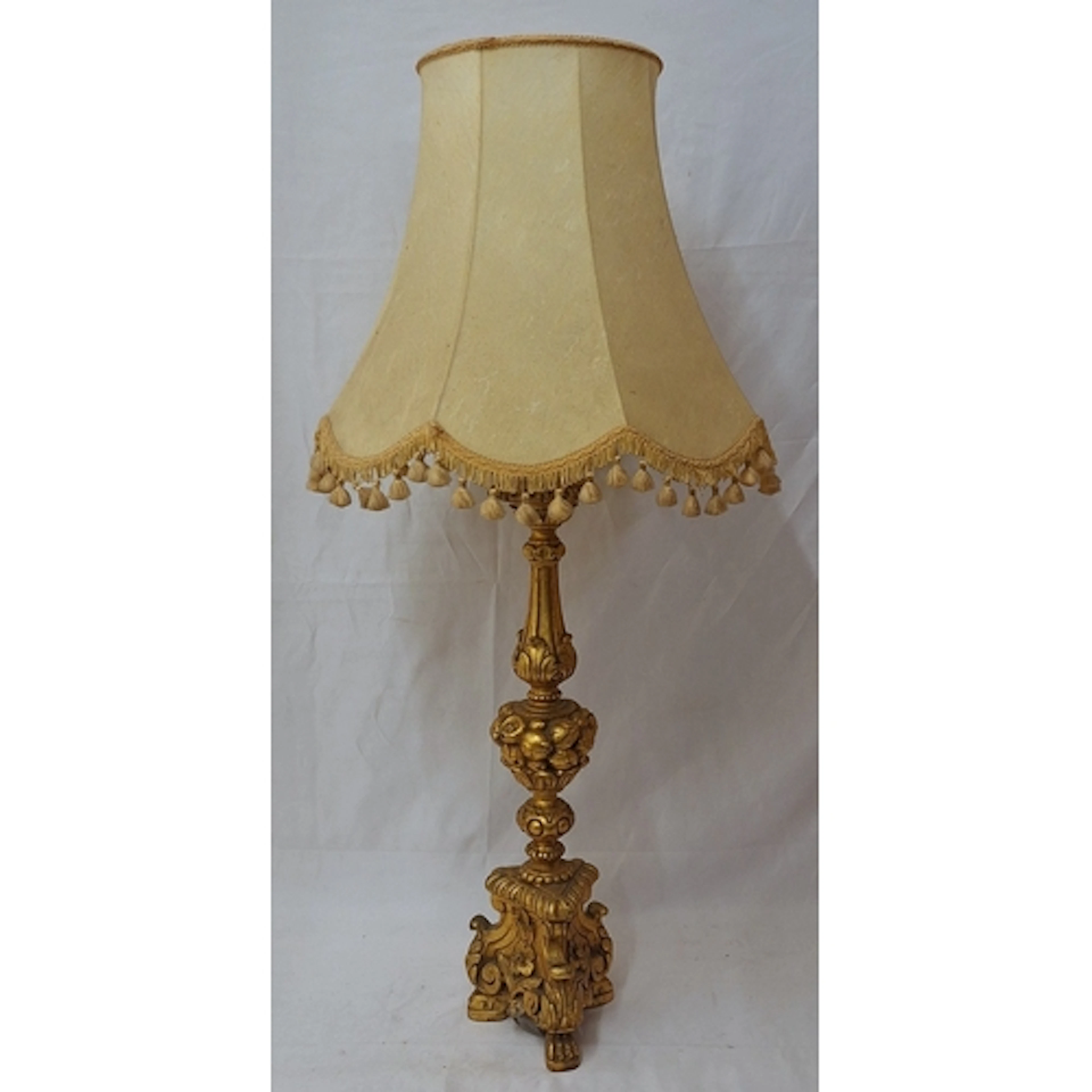 Gilt Tri Footed Lamp Base with cream tasselled shade approx....