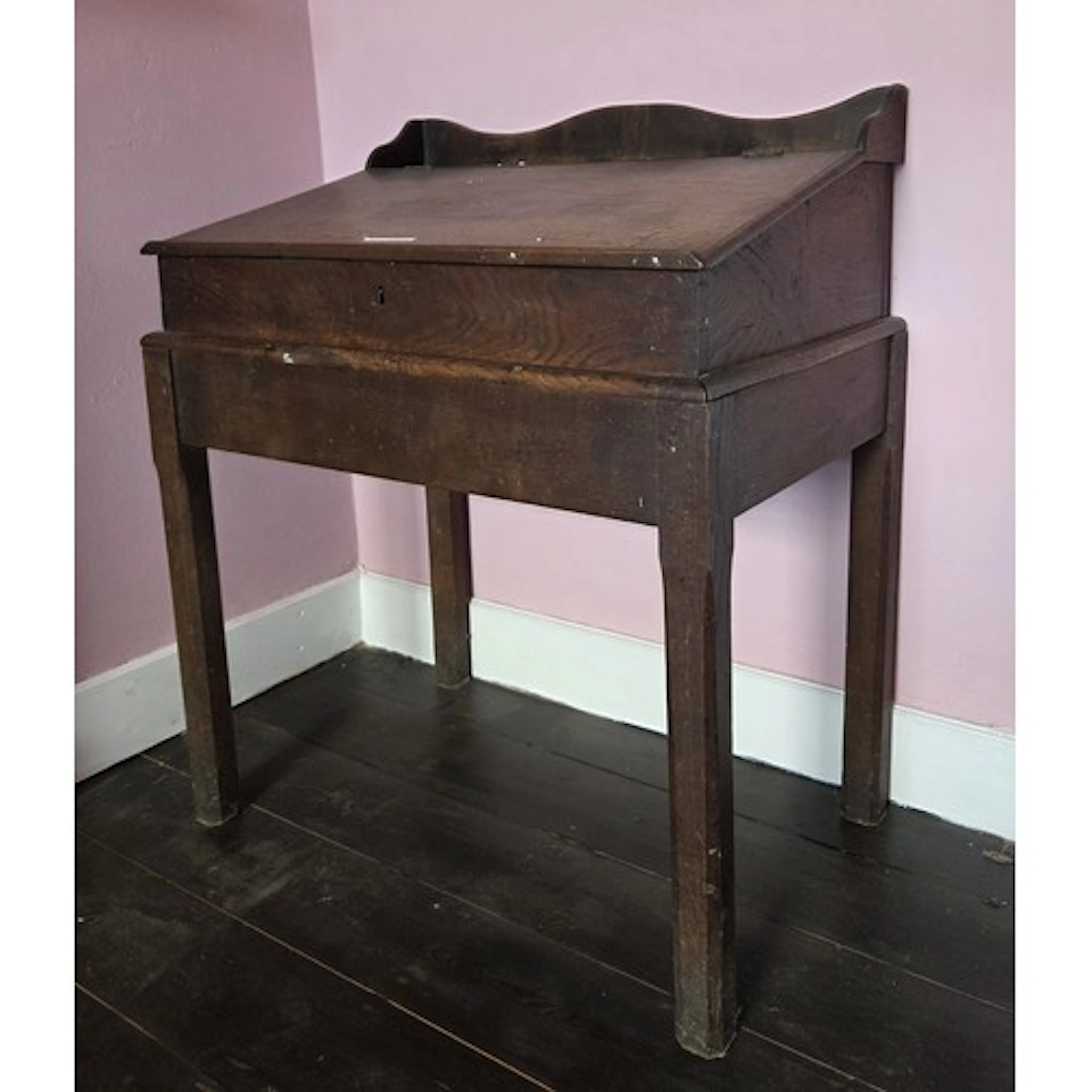 A good early 19th Century Oak Draftsman Desk with flap front...
