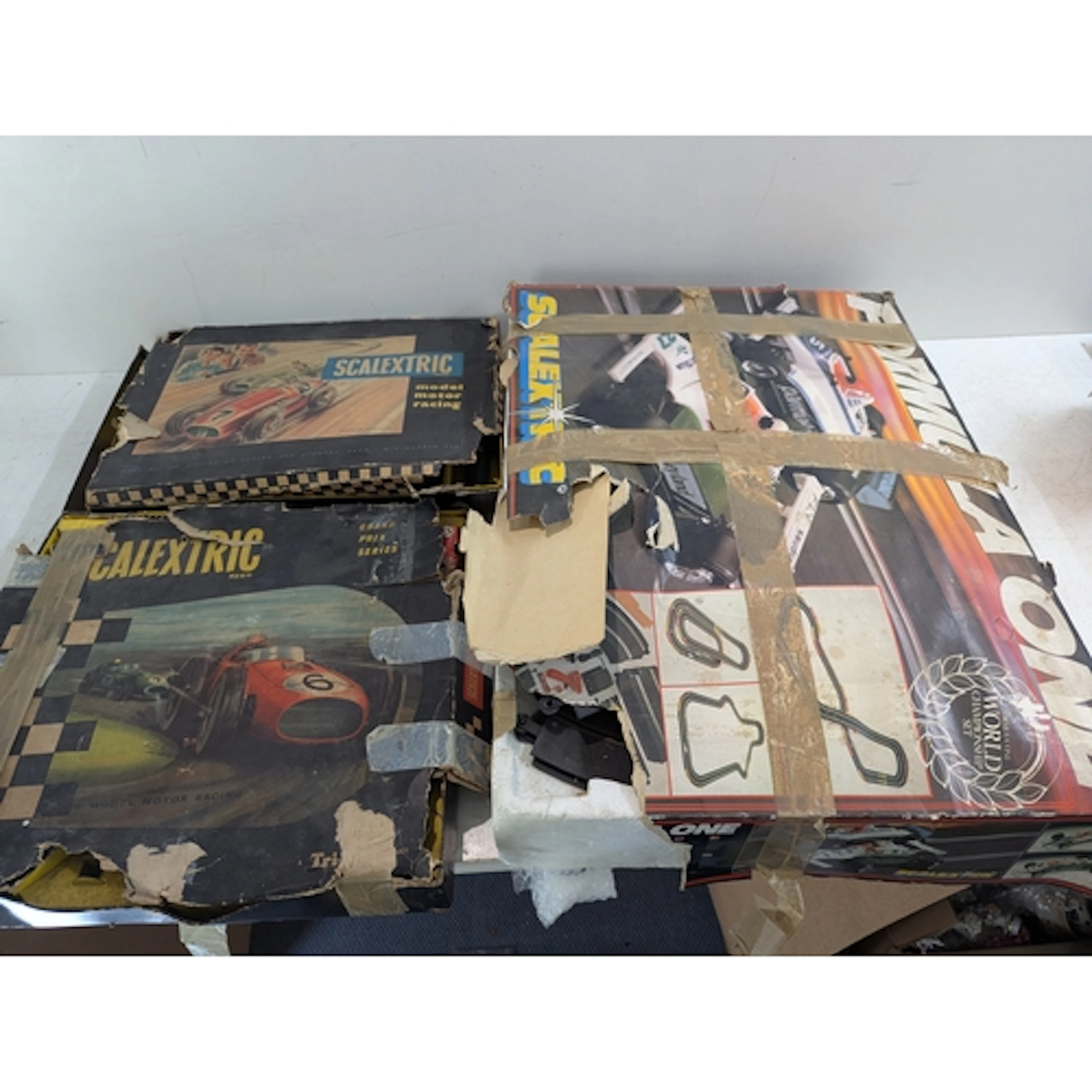 Three Scalextric boxed sets, a Grand Prix series, a Formula ...