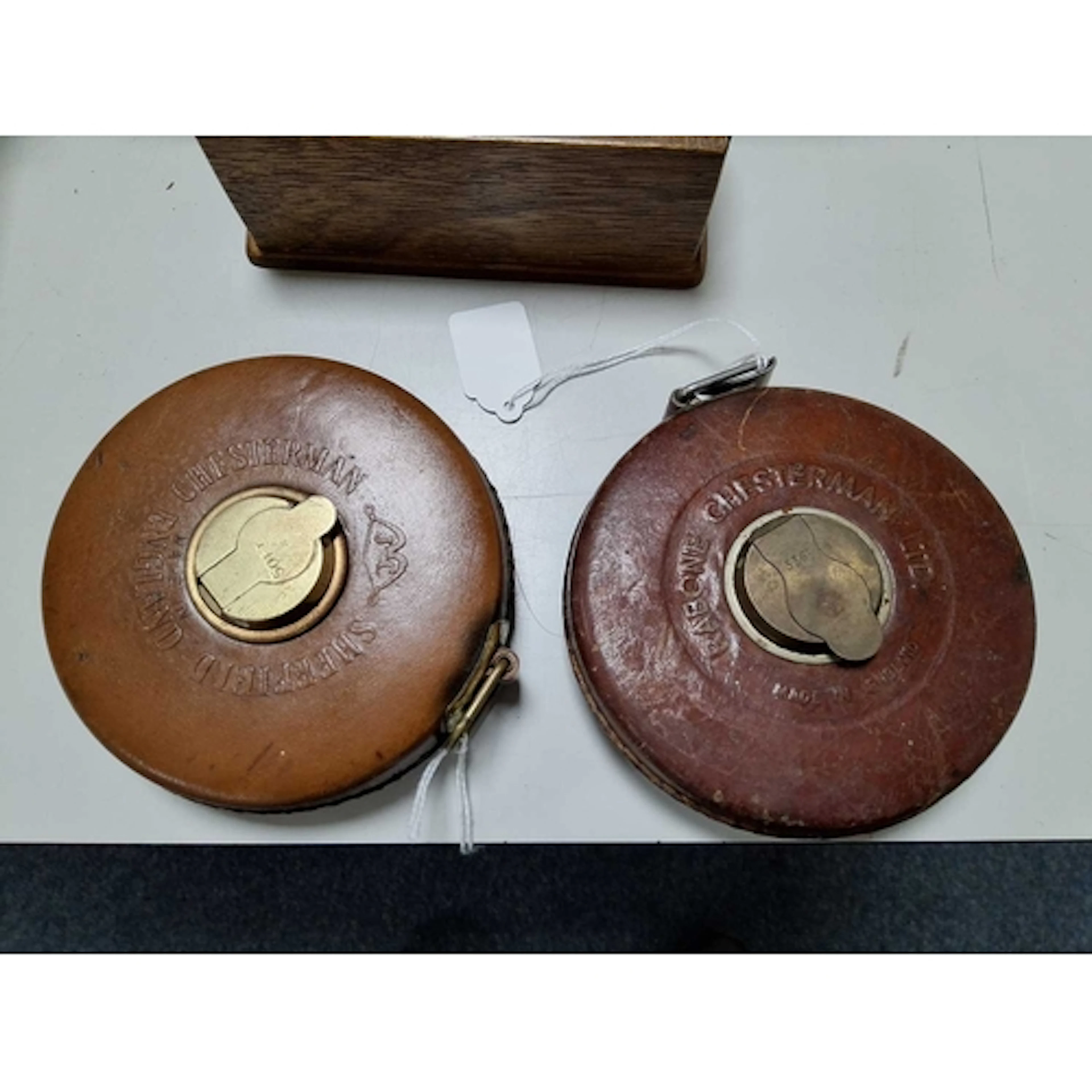TWO CHESTERMAN OF SHEFFIELD SURVEYORS MEASURING TAPES, both ...