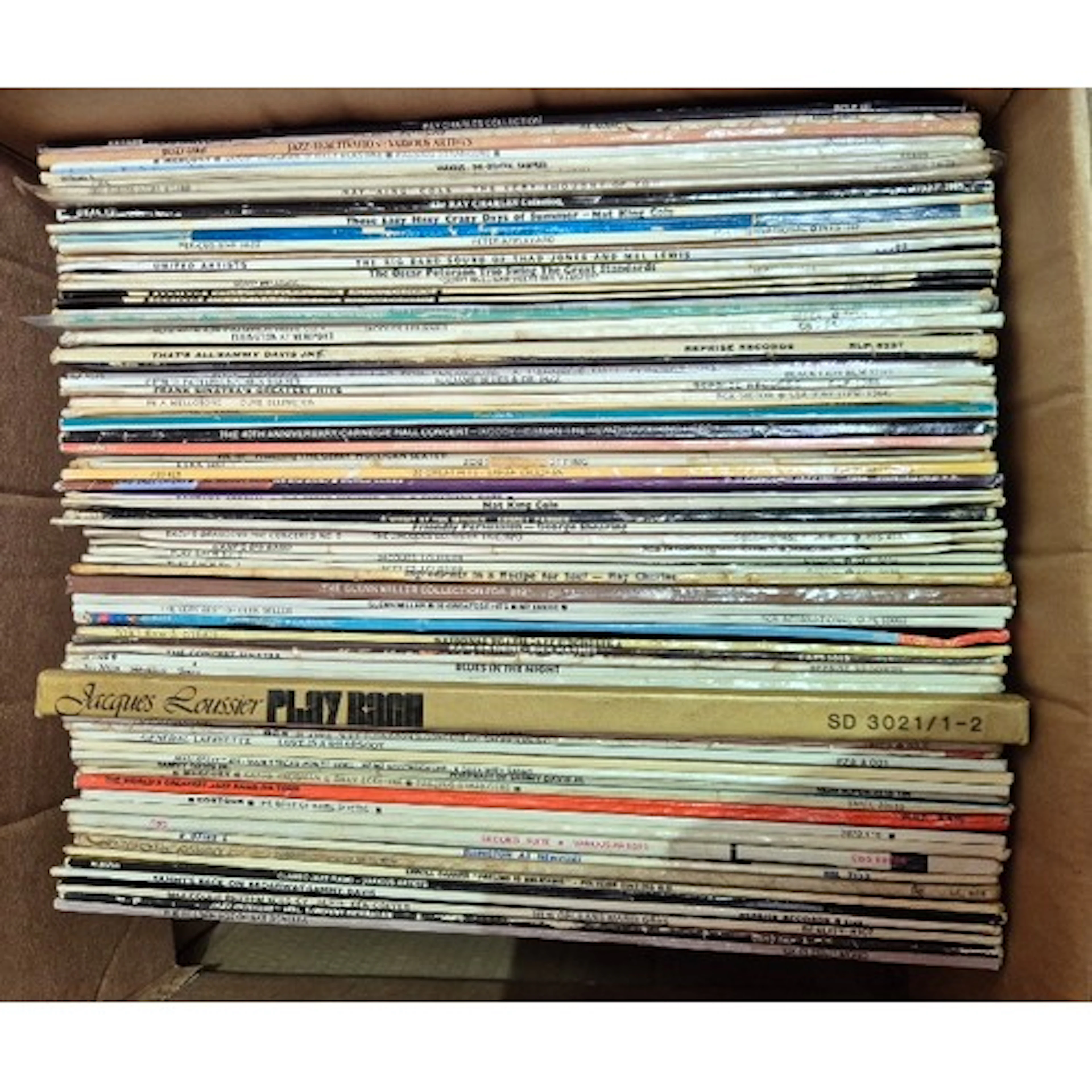A box of over 70 jazz vinyl LPs to include Ray Charles, Duke...