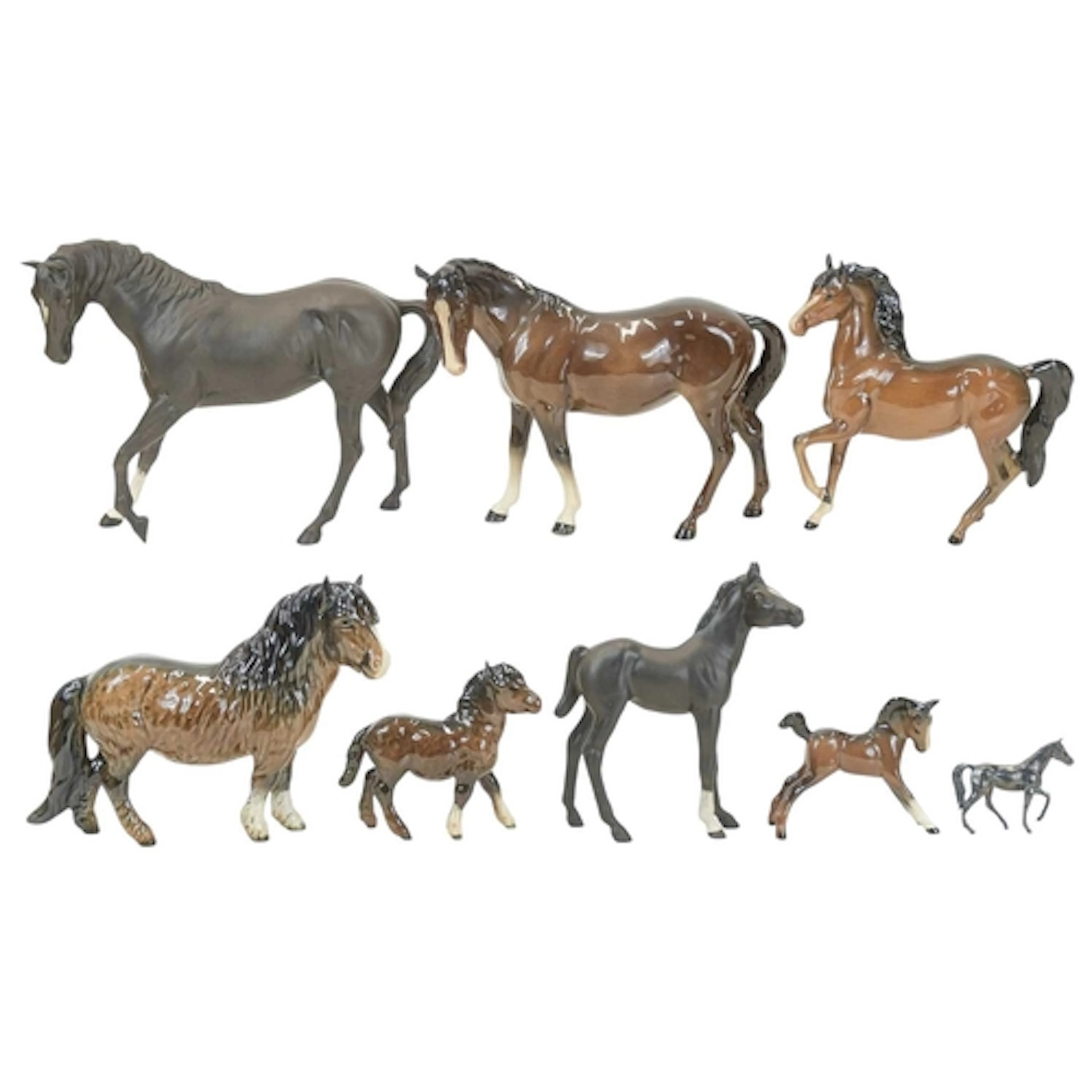 A Beswick matt black horse and foal. Heights 18cm and 15cm. ...
