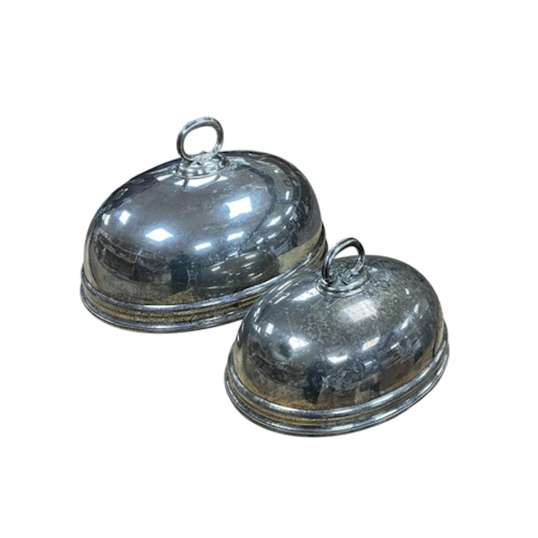 Two 19th century graduated old Sheffield plate meat domes, l...