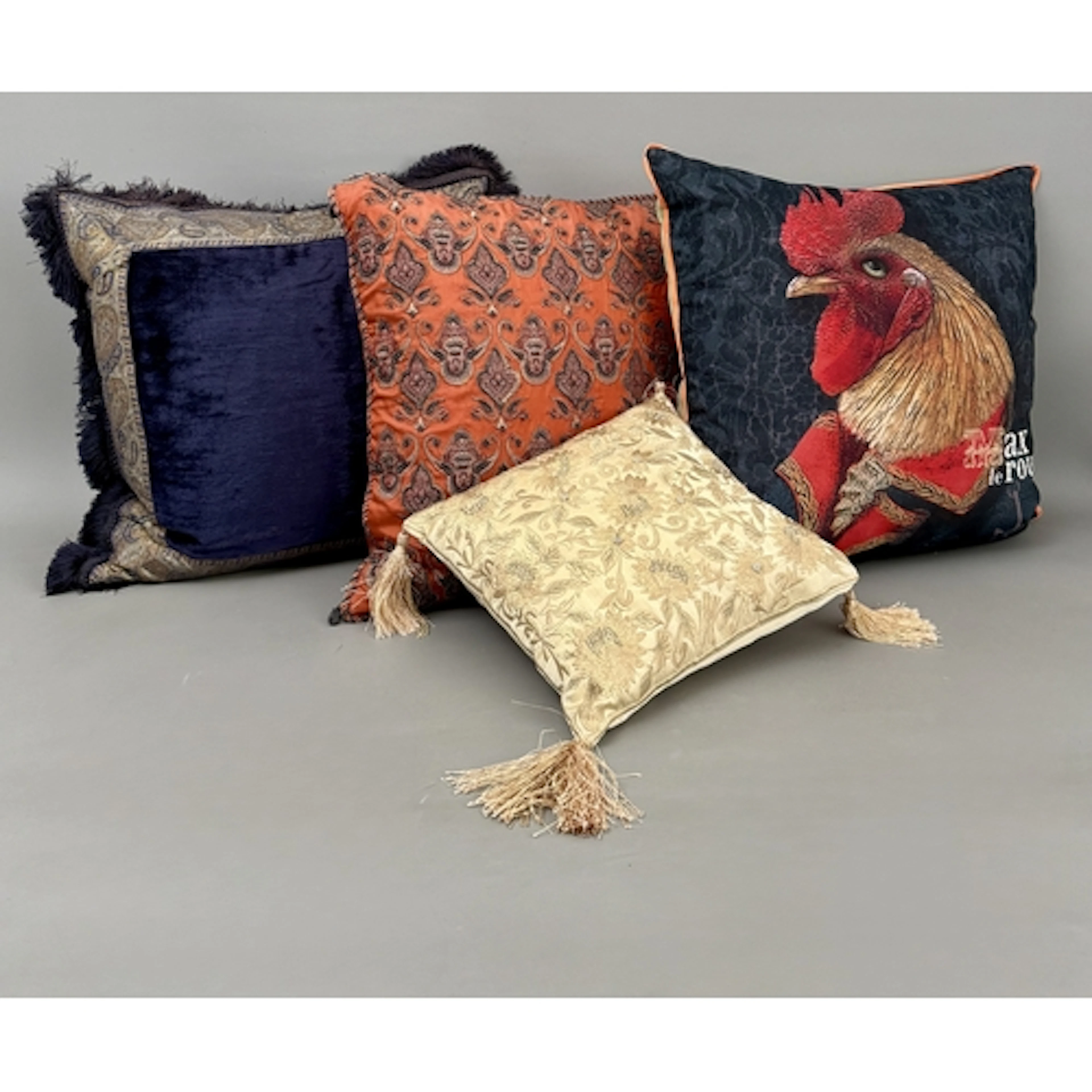 Eleven decorative scatter cushions including a Mulberry navy...