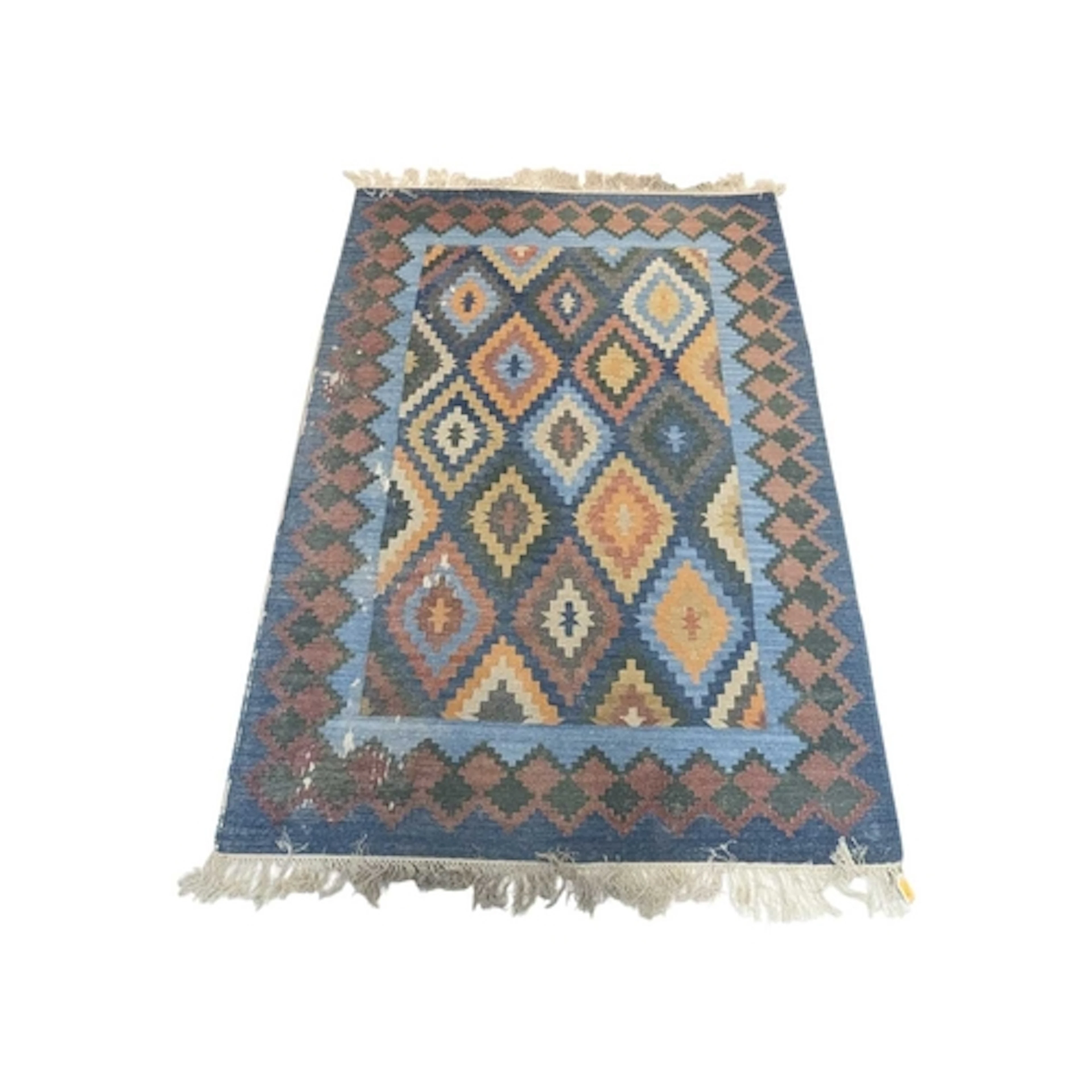 A 20th century Turkish kilim wool rug carpet. The rig having...