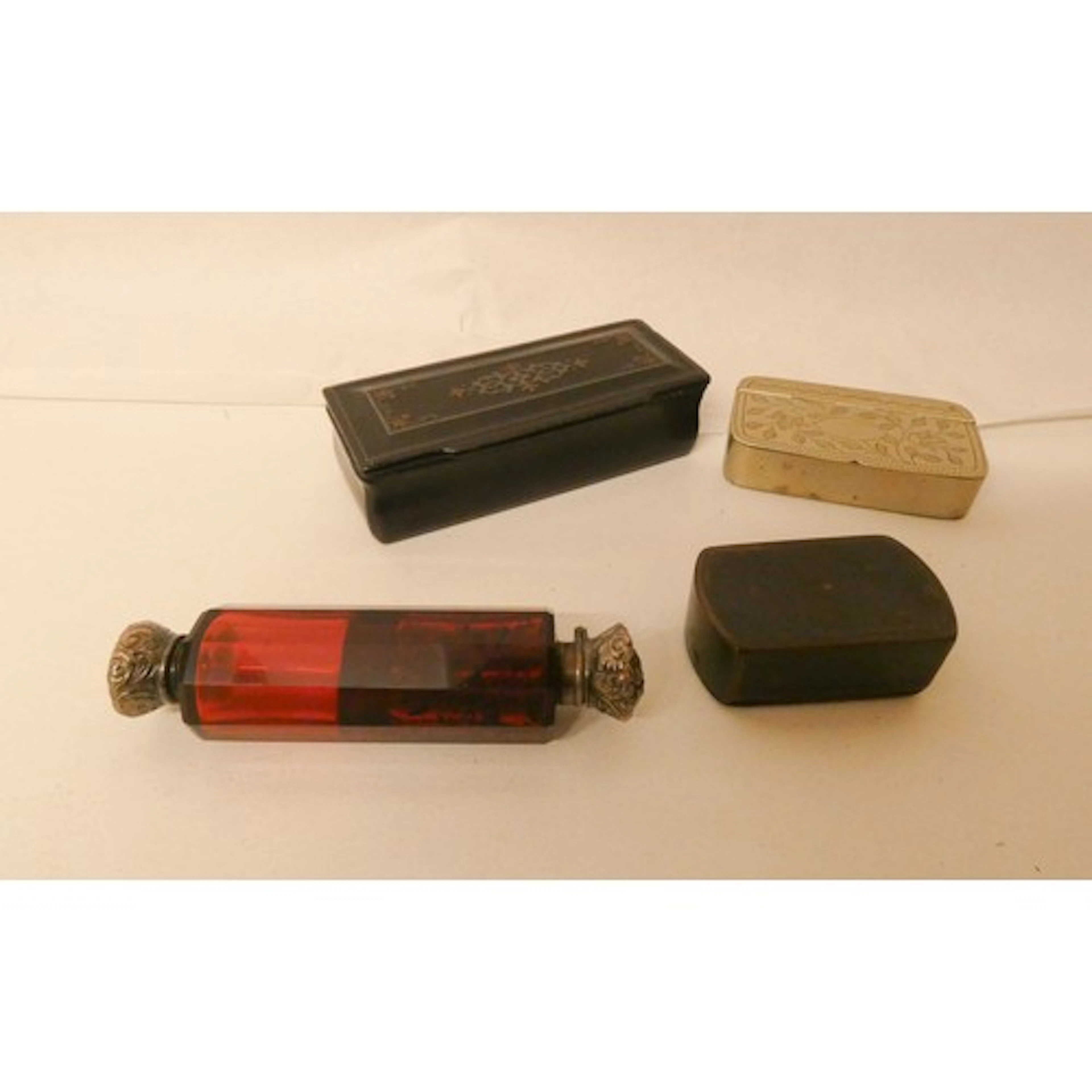 A Victorian ruby glass double ended scent bottle and three V...