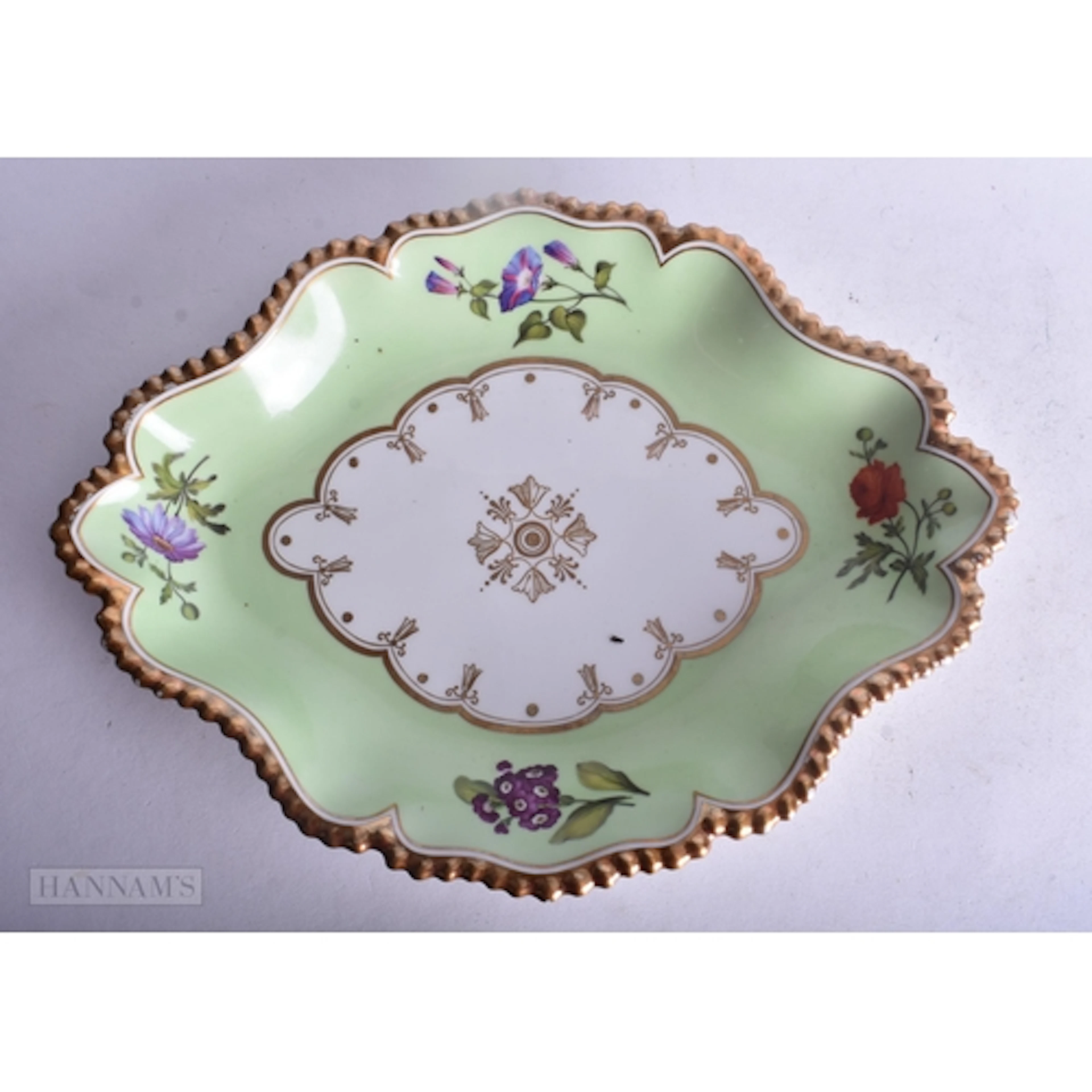 Flight Barr and Barr Worcester dish with gilt gadroon border...