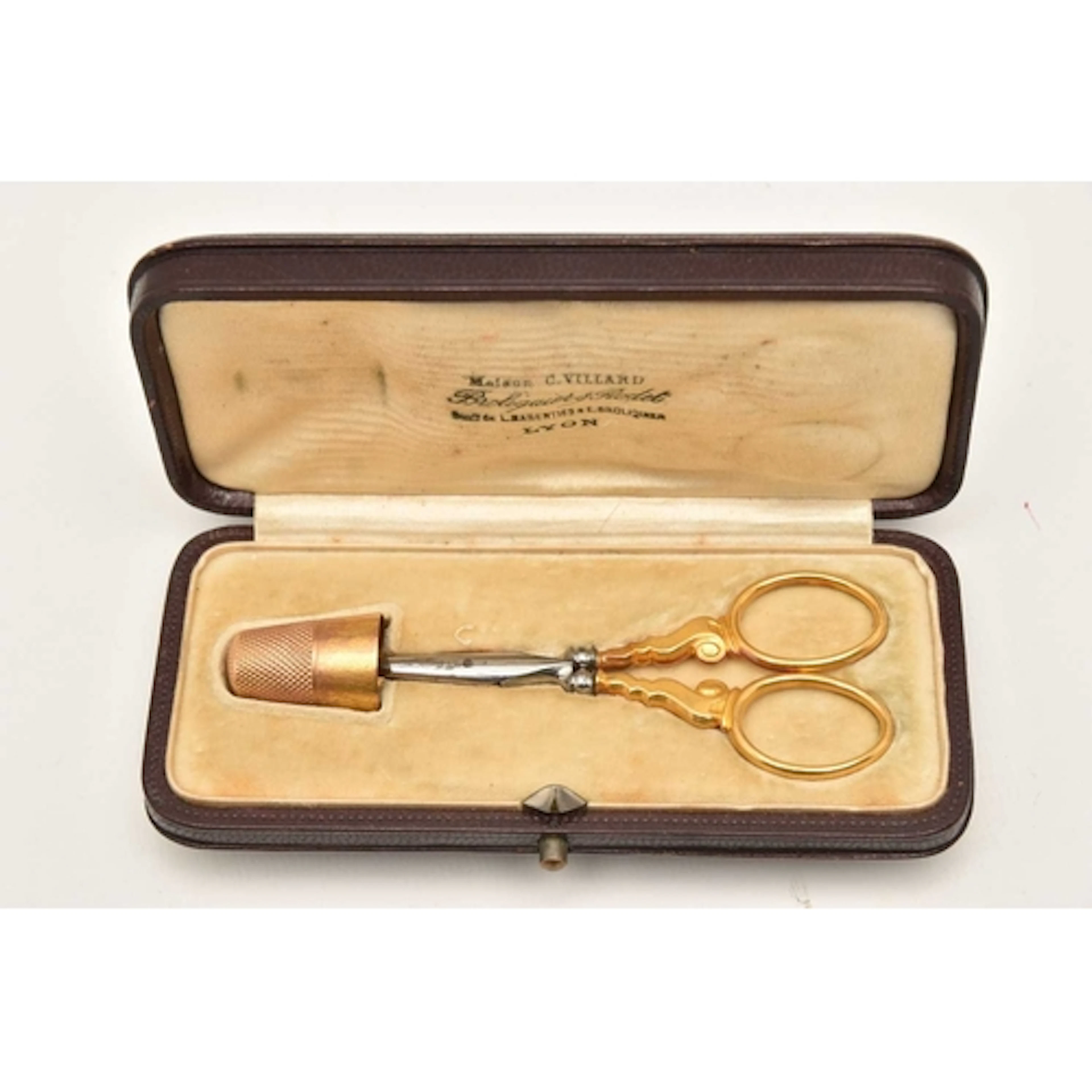 A FRENCH 19TH CENTURY CASED GOLD SEWING SET, a rectangular f...
