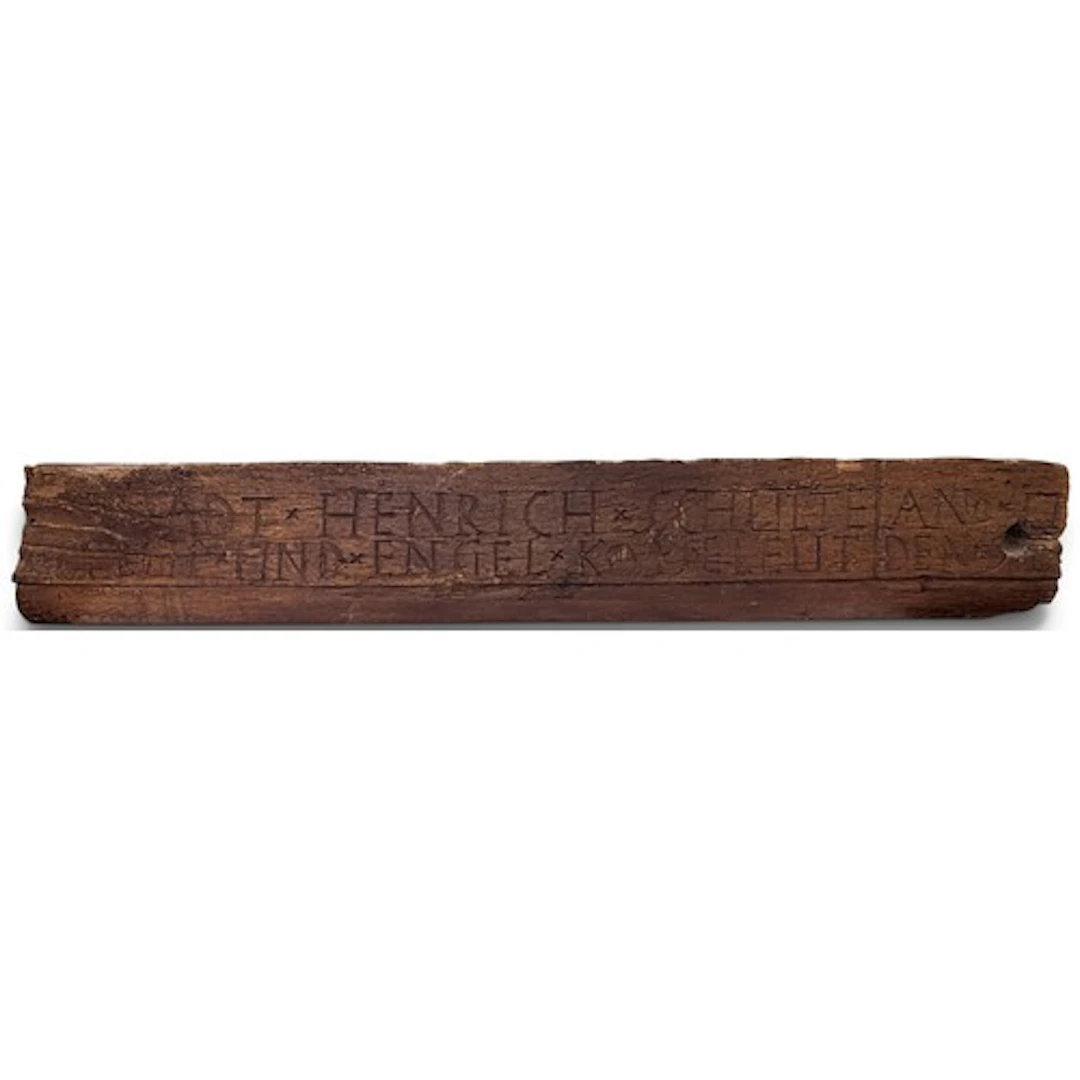 An unusual German inscribed oak beam section or panel with i...