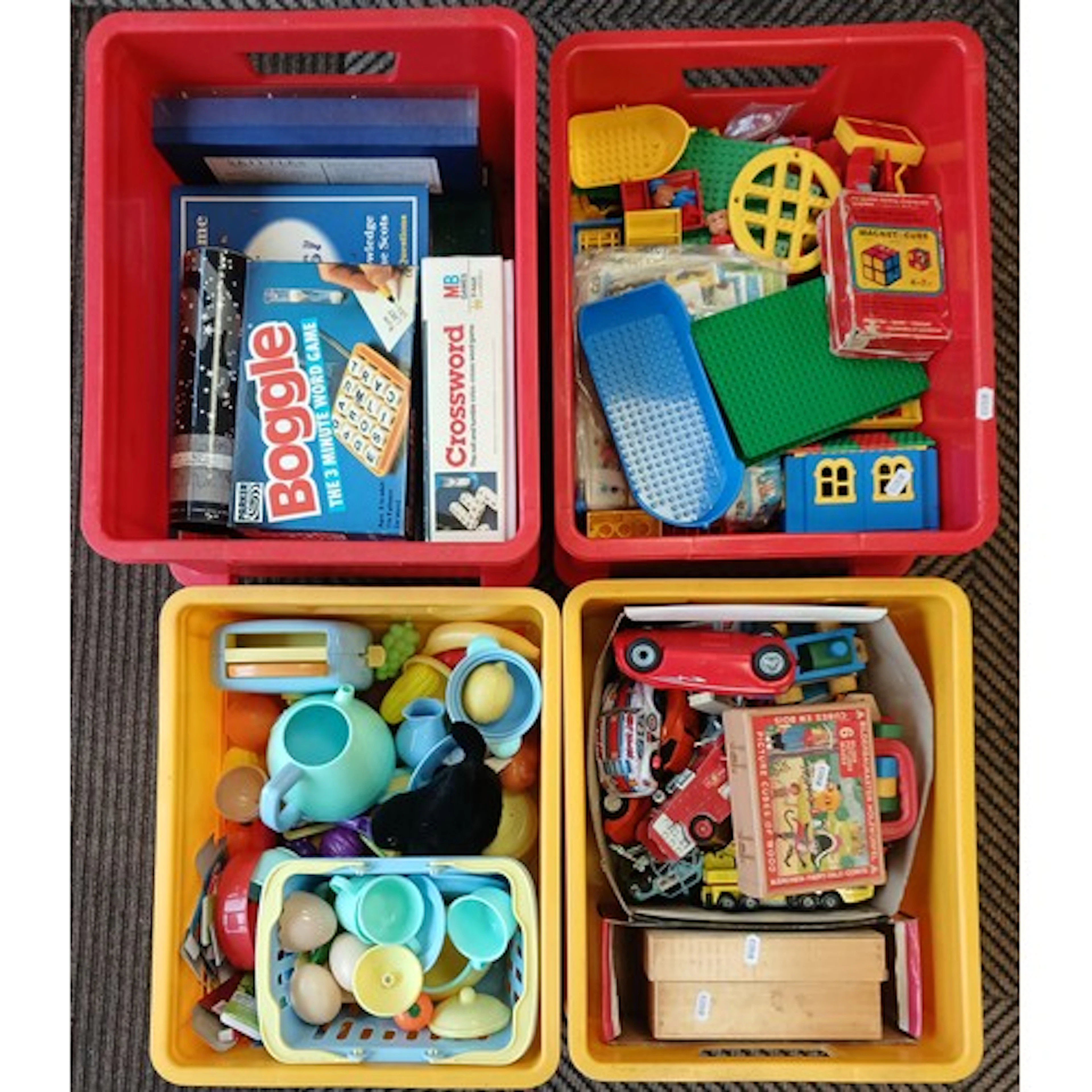 Four boxes of children,s toys.
