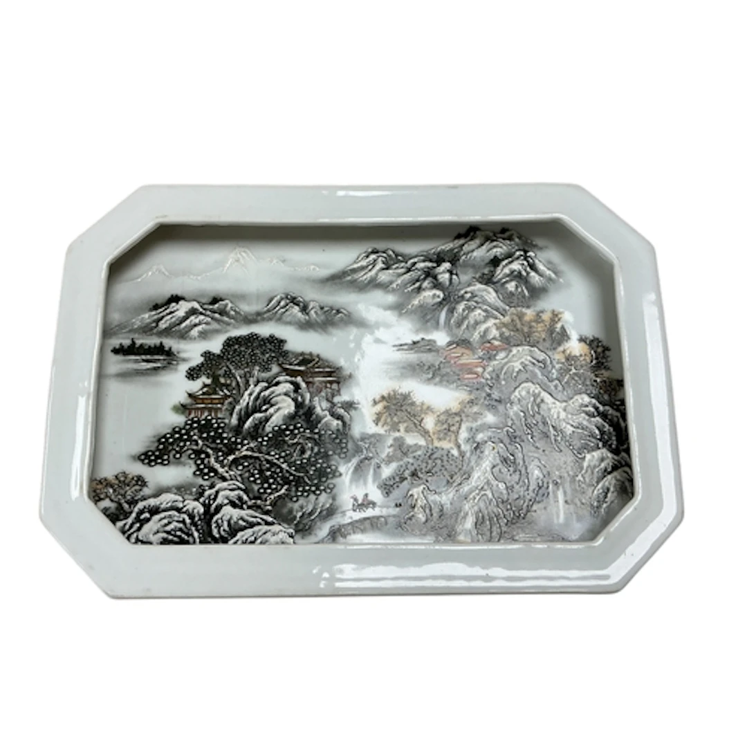 A Chinese rectangular porcelain tray, painted with mountaino...