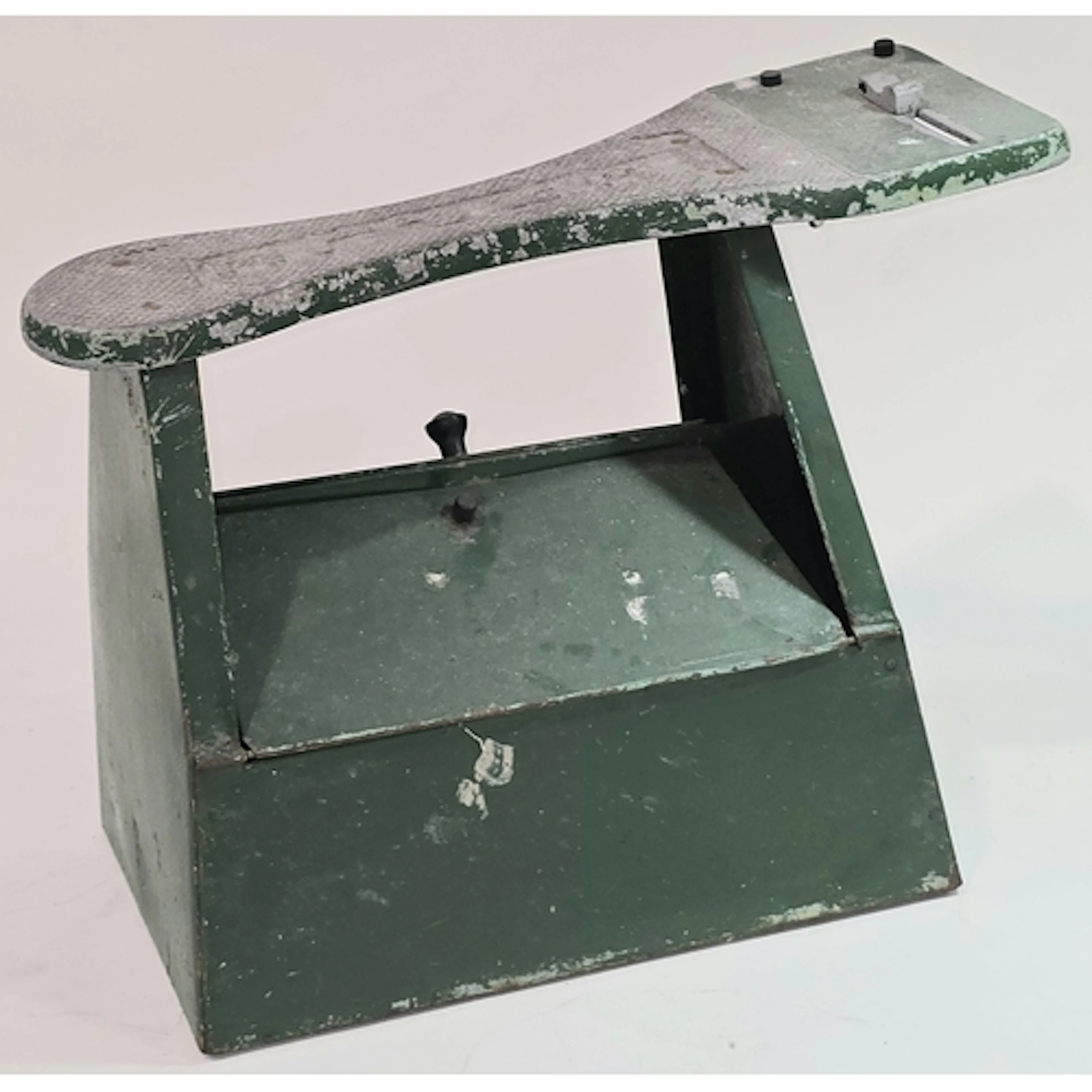 Vintage green painted metal Temple shoe shine box with an in...